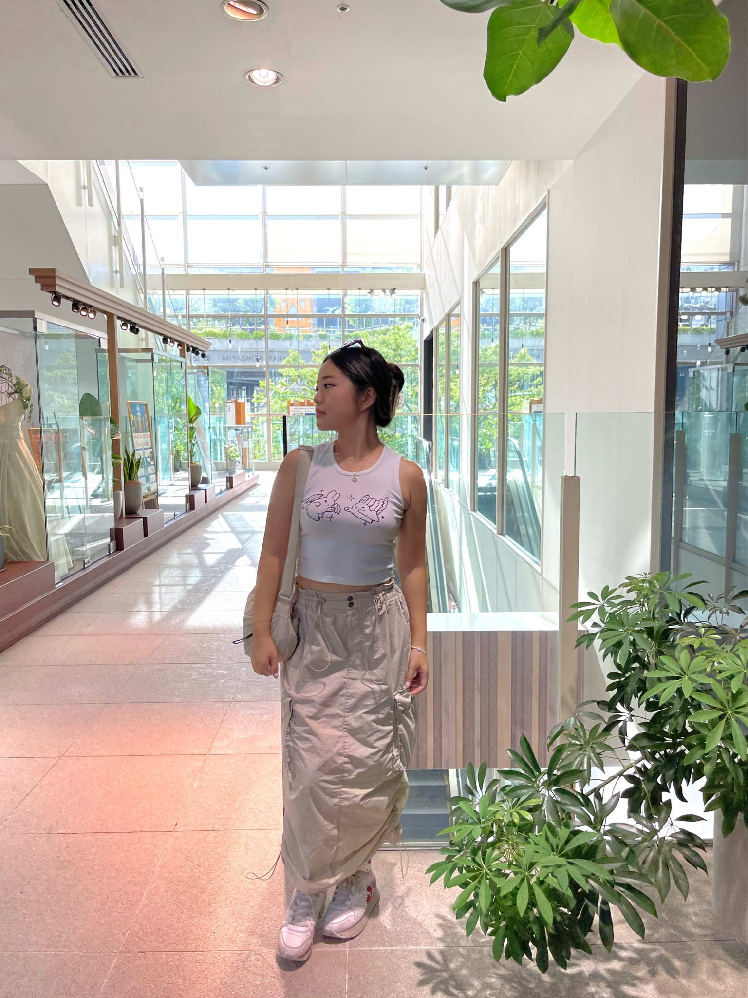 Tokyo japan travel outfit beige cargo skirt white tank top comfortable 🤍

#LTKfindsunder100 #LTKtravel #LTKfindsunder50