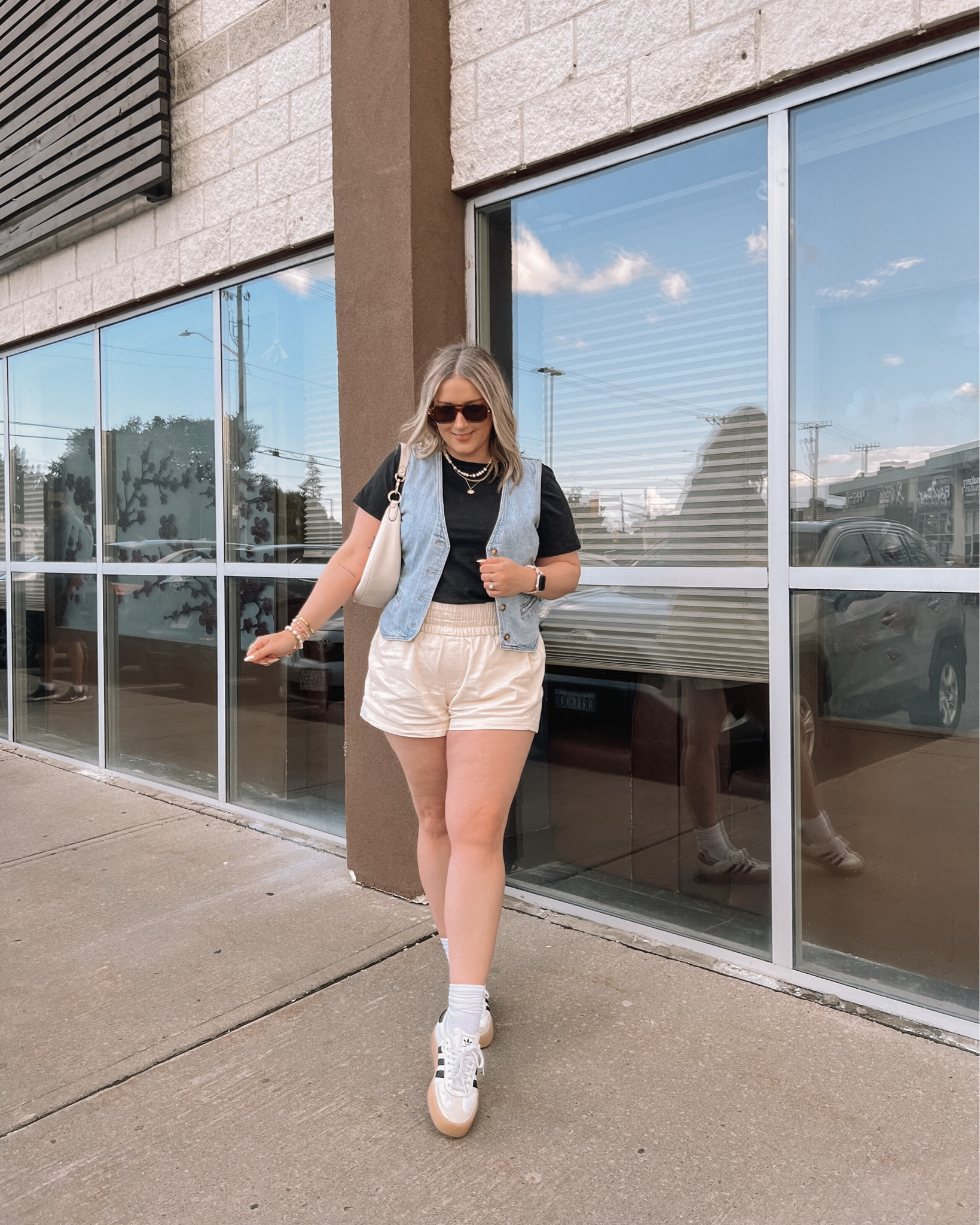 Casual midsize summer outfit - denim vest, basic black tee, my fave comfy shorts. Wearing my usual size L in all. Size down in the adidas sambas 

#LTKmidsize #LTKcanada #LTKsummer