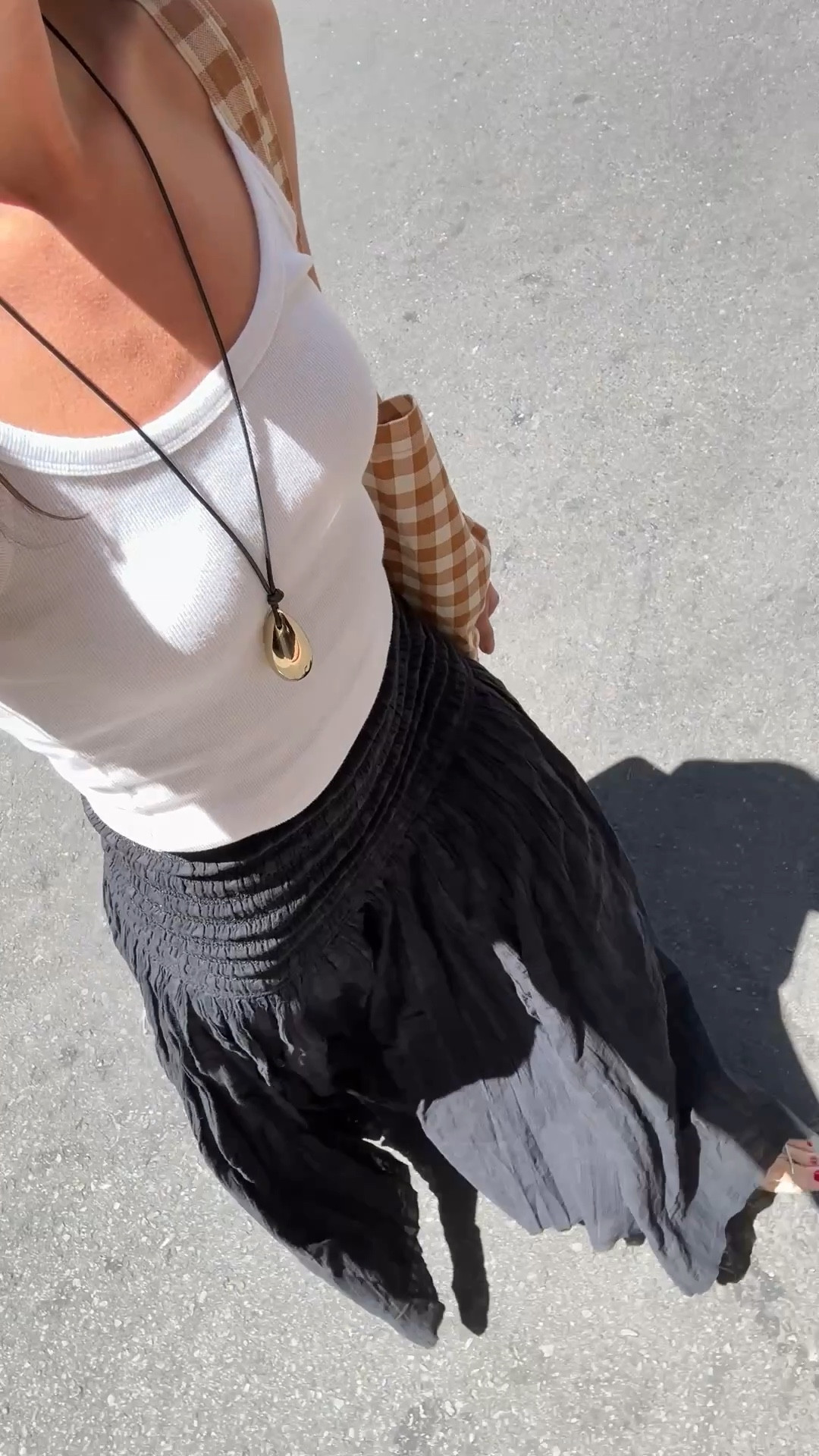 I’m 5’7” wearing a small in the tank top and XS in the skirt! 
