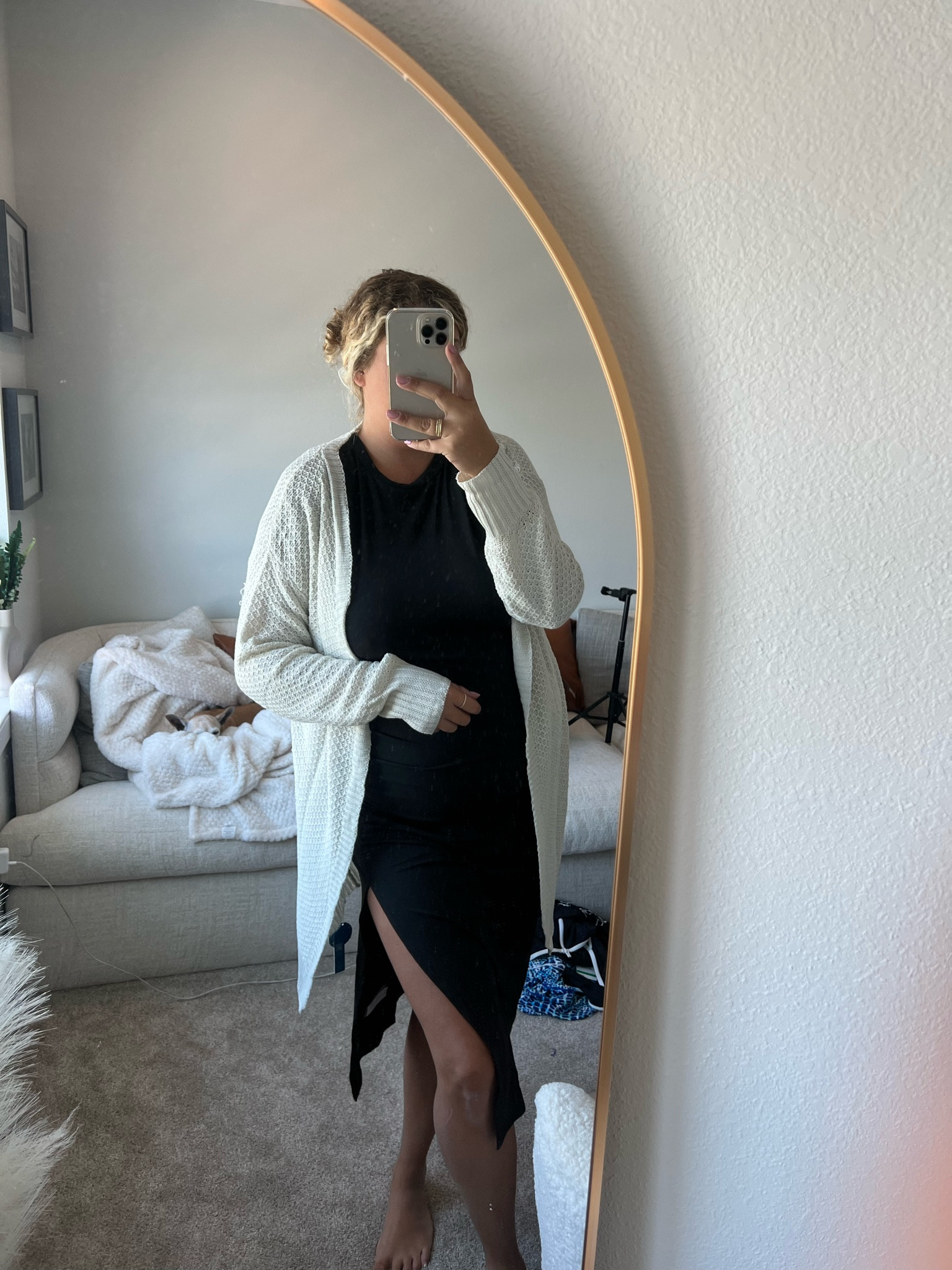 Black cinched bodycon midi dress and lightweight knit cardigan 

#LTKSeasonal #LTKstyletip #LTKunder50