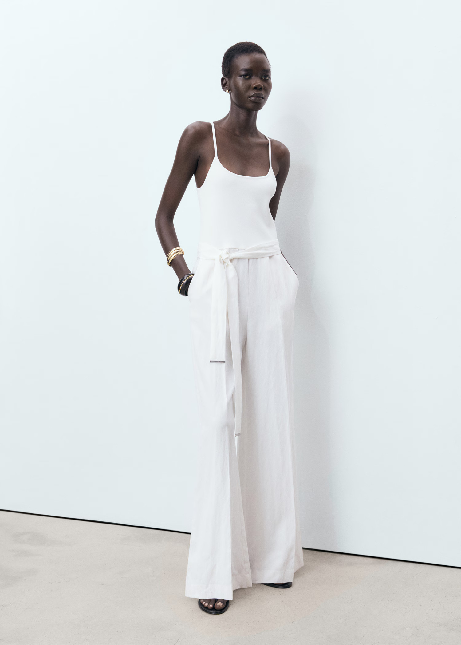 Online ExclusiveJumpsuit with beltCurrent price [US$ 149.99 ]US$ 149.99Select a colourOff White | Mango (US/MX/AU)