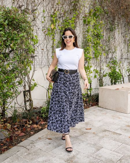 Look chic and stylish this spring and summer with this black skirt and white top combination! Added some black strappy heels, a handbag, and the best white cateye sunnies!
#fashionfinds #springclothes #casualwear #petitefashion

#LTKSeasonal #LTKStyleTip #LTKItBag