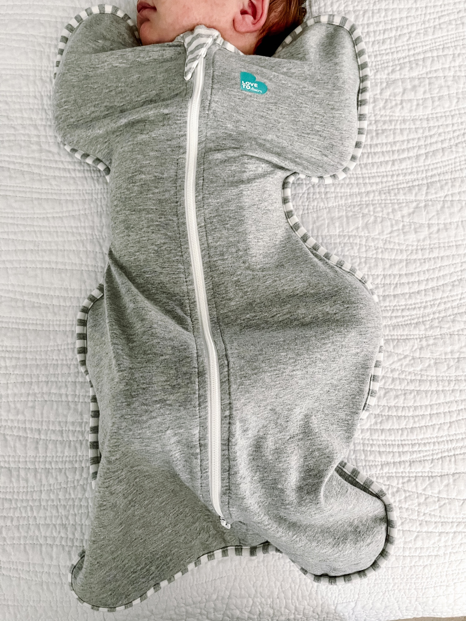 If your baby likes to sleep with their arms up, the Love to Swaddle Up sleep sack is a great option to try  

#LTKbump #LTKbaby #LTKGiftGuide