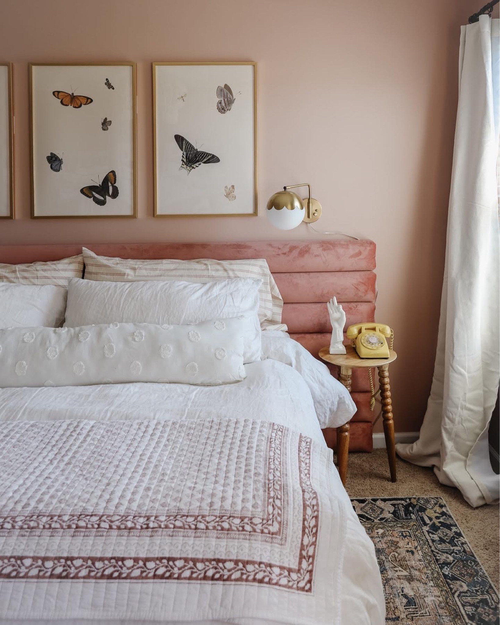 Teen room, pink room, pre-teen room, vintage butterfly art, pink and blue vintage inspired rug, girl room, pink bed, kid room, kid art, block print quilt, scalloped sconce, plug-in sconce, brass sconce 