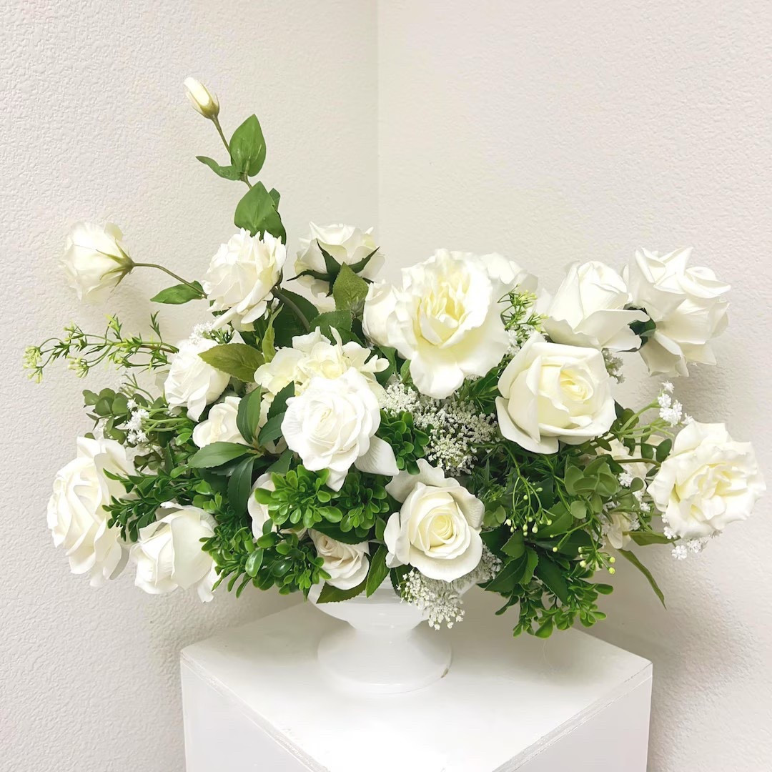 Clean, classic, and effortlessly elegant 🤍 This white and green artificial centerpiece features premium real-touch roses, hydrangeas, and soft greenery for a fresh-from-the-garden look that lasts year after year. Handcrafted to order, it’s a stunning choice for wedding tables, special gatherings, or elevating everyday spaces with timeless beauty—no maintenance required.
#LTKfinds #EtsyHomeDecor #ArtificialFlowers #RealTouchFlorals #WeddingCenterpiece #NeutralDecor #EverlastingFlowers #EventStyling

#LTKHome #LTKSeasonal #LTKHoliday