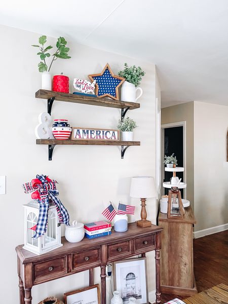 Patriotic summer decor for Memorial Day and Fourth of July. Decorate in red white and blue. Shelf styling. Console table decor  

#LTKSeasonal #LTKhome