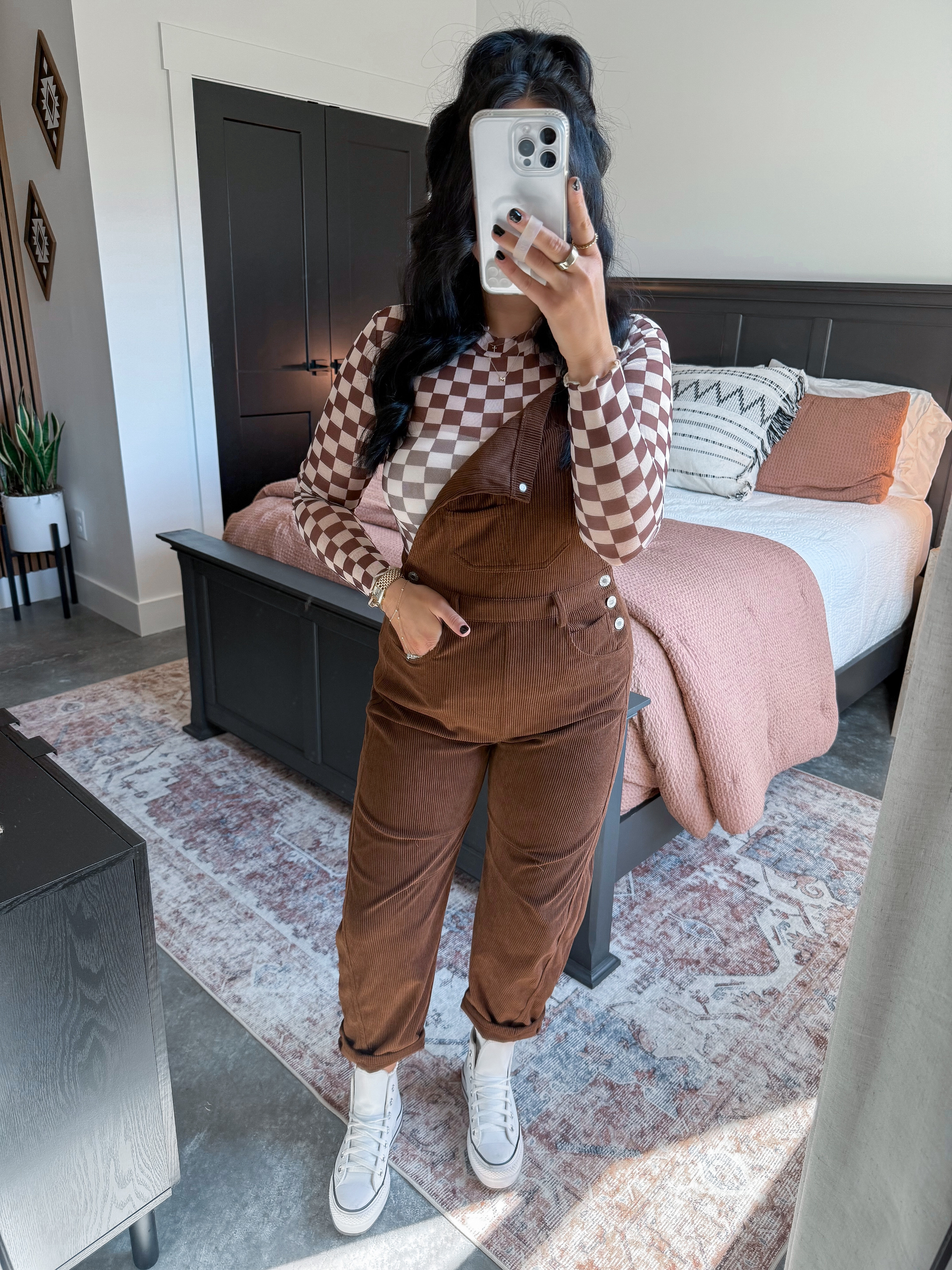 Casual Thanksgiving Outfit 🤎🍁

Checkered Top - small (my exact seller is sold out, so I linked another!)
Overalls - small (my exact seller is sold out, so I linked another!)
Bandeau - medium

If you're looking for a casual Thanksgiving look that is still comfortable and can be worn after the holiday, this is the perfect outfit! 👏🏼 I love anything checkered print, and this brown and white combo is so good for fall. I layered it under these brown corduroy overalls & finished the look with my white leather platform converse! 

 

 #LTKHoliday #LTKFindsUnder100 #LTKStyleTip