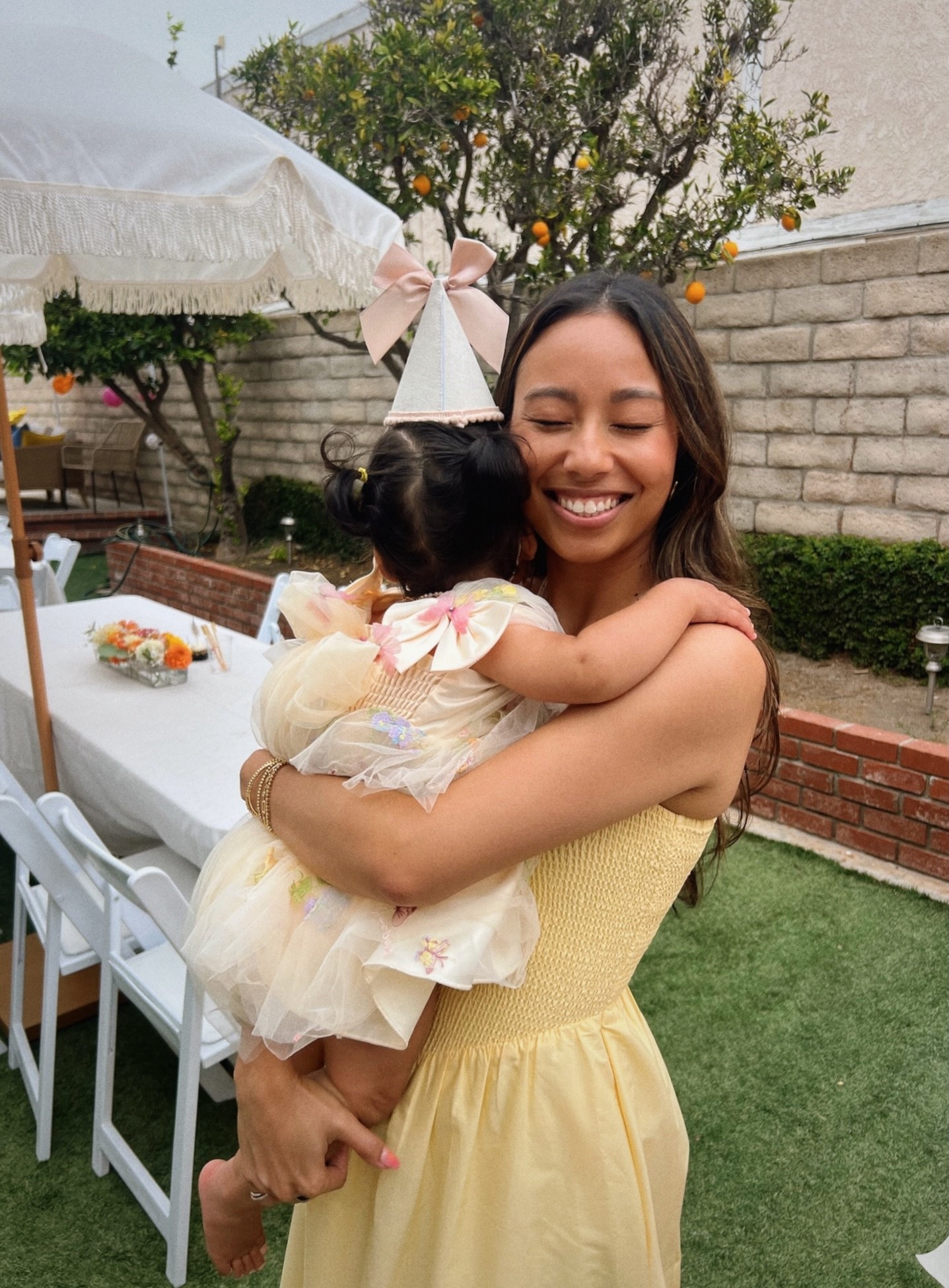 first birthday party dresses for both mama and the birthday girl! 💛 | yellow sundress | butter yellow dress | birthday party dress | one year old birthday dress | smash cake dress | party hat 

#LTKFamily #LTKKids #LTKBaby