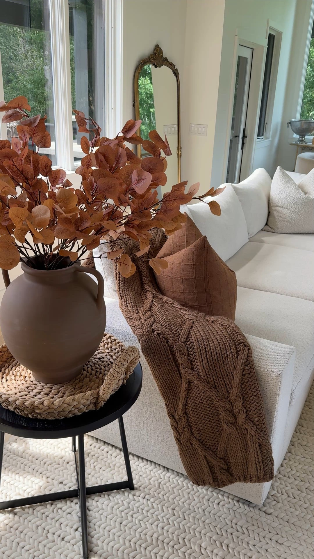 Fall living room styling! New affordable finds from Target: chocolate knit throw, stems and a brown pumpkin 🤎🍂 Paired with old autumn decor favorites: yellow/brown eucalyptus stems and linen pillow covers from Amazon!

Home decor 
Sectional
Coffee table styling 

#LTKSeasonal #LTKFindsUnder50 #LTKHome