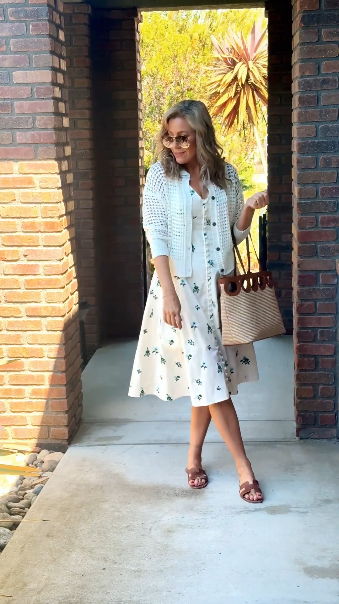 This outfit is giving picnic in the garden meets casual brunch chic. I layered this breezy floral midi dress with a textured open-knit cardigan (my Amazon gem of a third layer!) that adds polish without extra heat. Woven tote, comfy slides, and oversized sunnies complete the look. Effortless and elevated for weekend outings, lunch with friends, or a winery visit.

📍Where to wear: Brunch, farmers market, wine tasting, or a summer baby shower
🧥 Third Layer Highlight: White crochet-style knit cardigan from Amazon — light and breathable but still adds structure!

ootd, fashionover30, fashionover40, fashionover50, casualoutfits, stylishandgrateful, stylish&grateful, modestoutfits, classy casual, summerlayers, picnicoutfit, brunchstyle, amazonfashion, cardigansweater, summerstyleinspo, floraldresslook, wineryoutfit, gardenpartylook, amazonfinds, lightweightlayer

#LTKSeasonal #LTKParties #LTKOver40
