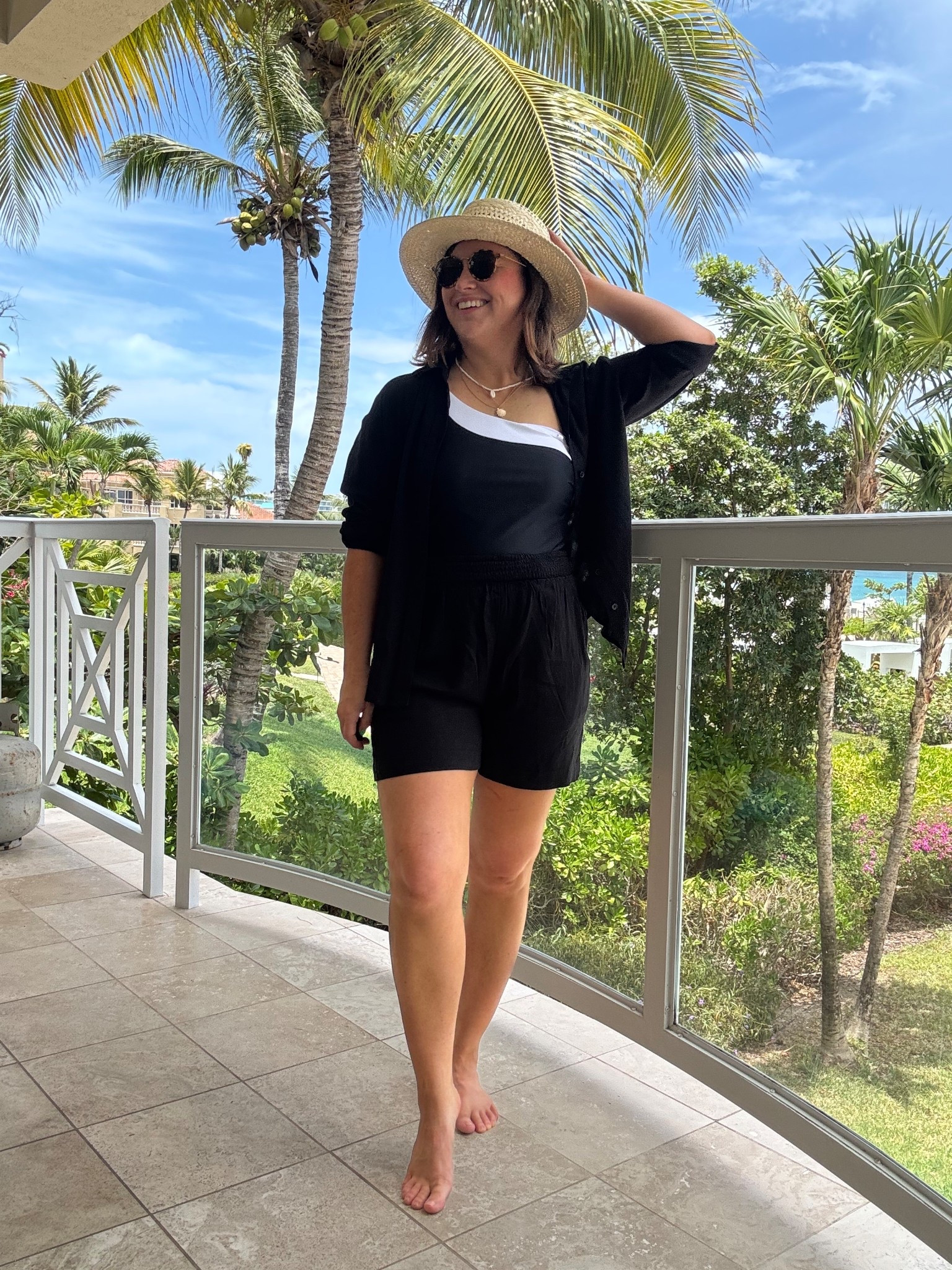 Beach holiday outfit. Black shorts and shirt coord beach cover up. Black and white swimsuit. Holiday outfit. Summer outfit inspiration. 

I wear a size 12 in swimsuit. Size 12 in shorts and size 10 in shirt. 

#LTKstyletip #LTKsummer #LTKpetite
