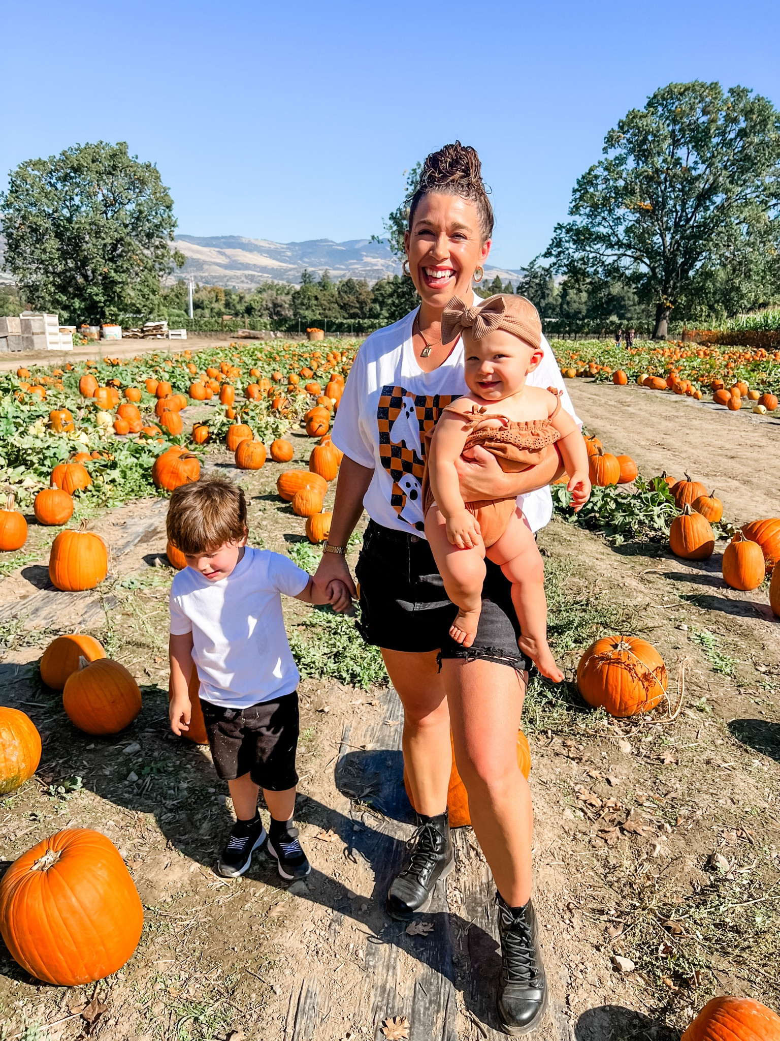 Pumpkin patch. Halloween t-shirt. Ghost t-shirt. Pumpkin patch outfit. Toddler boy fall outfit. Baby girl fall outfit. Baby girl romper. Black combat boots. Black denim shorts. #kidspumpkinpatch #pumpkinpatchoutfit #falloutfit #fallboots #fallweekendfun

#LTKbaby #LTKHalloween #LTKkids