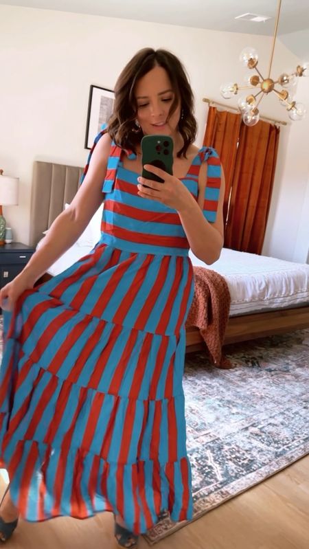 Such a cute striped maxi dress for spring/summer. Has adjustable tie  straps. One layer but not see through at all.

Love the layered look of the skirt. 