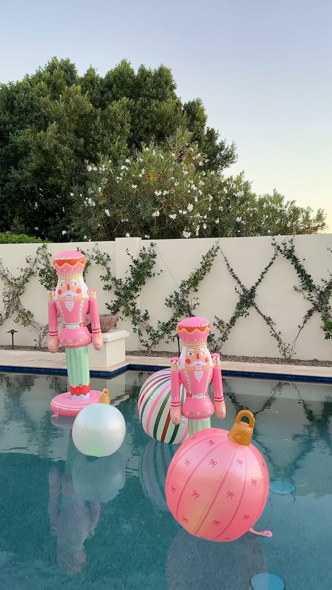 The holiday decor we didnt know we needed 💗 he had no clue what was in the box 😂 these pink nutcracker floats can be staked in the yard or float in the pool! Perfect for those girly girls that like pink Christmas decor 💗

#LTKHoliday #LTKmomlife #LTKHome