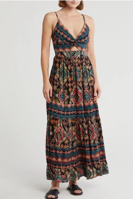 Angie
Twist Front Maxi Dress

A smocked back panel comfortably shapes a sleeveless dress with a sweeping skirt and a folksy print

#LTKParties #LTKWorkwear #LTKStyleTip