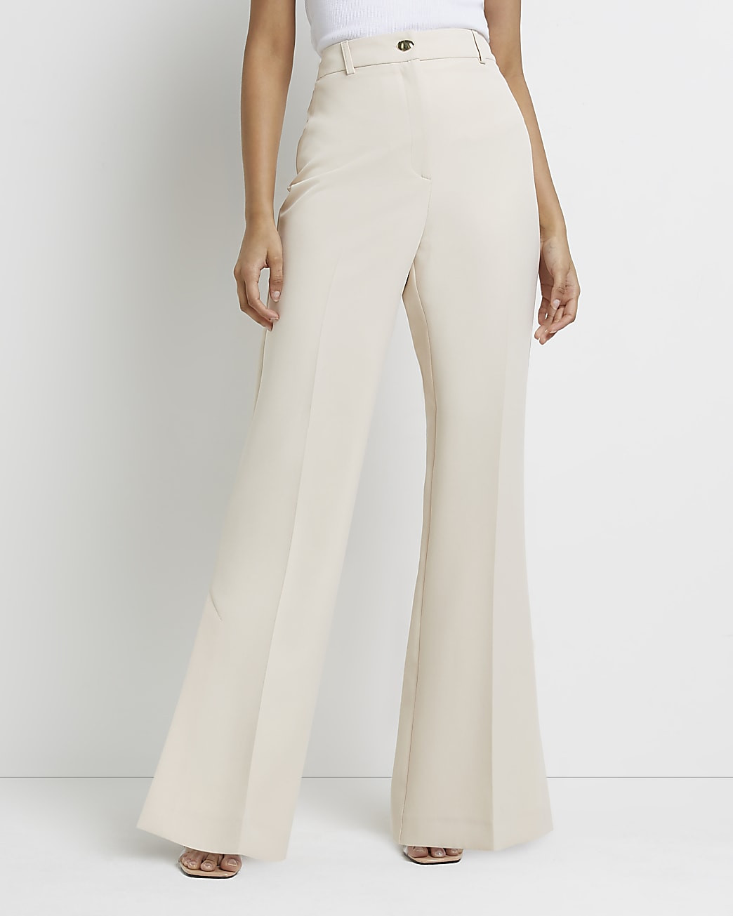 Cream split hem flared trousers | River Island (UK & IE)
