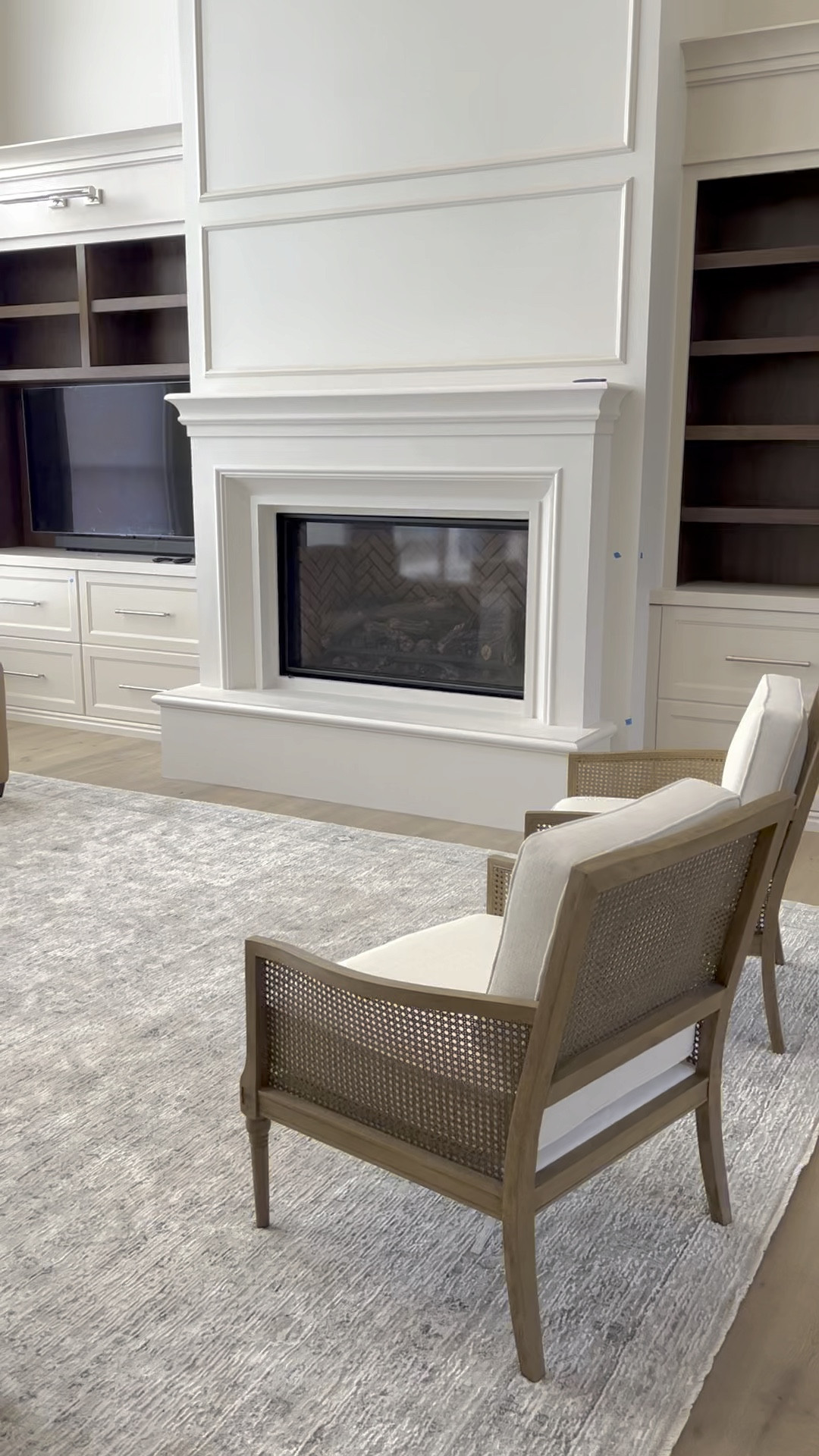 The key furniture pieces that make up our traditional living room are a beautiful set of cushioned accent chairs with cane detail, a rich leather sofa with sloped arms, a soft velvet sofa with bench seating, and a large neutral rug that ties the space together.

#potterybarn #rug #neutrallivingroom

#LTKfamily #LTKhome #LTKstyletip