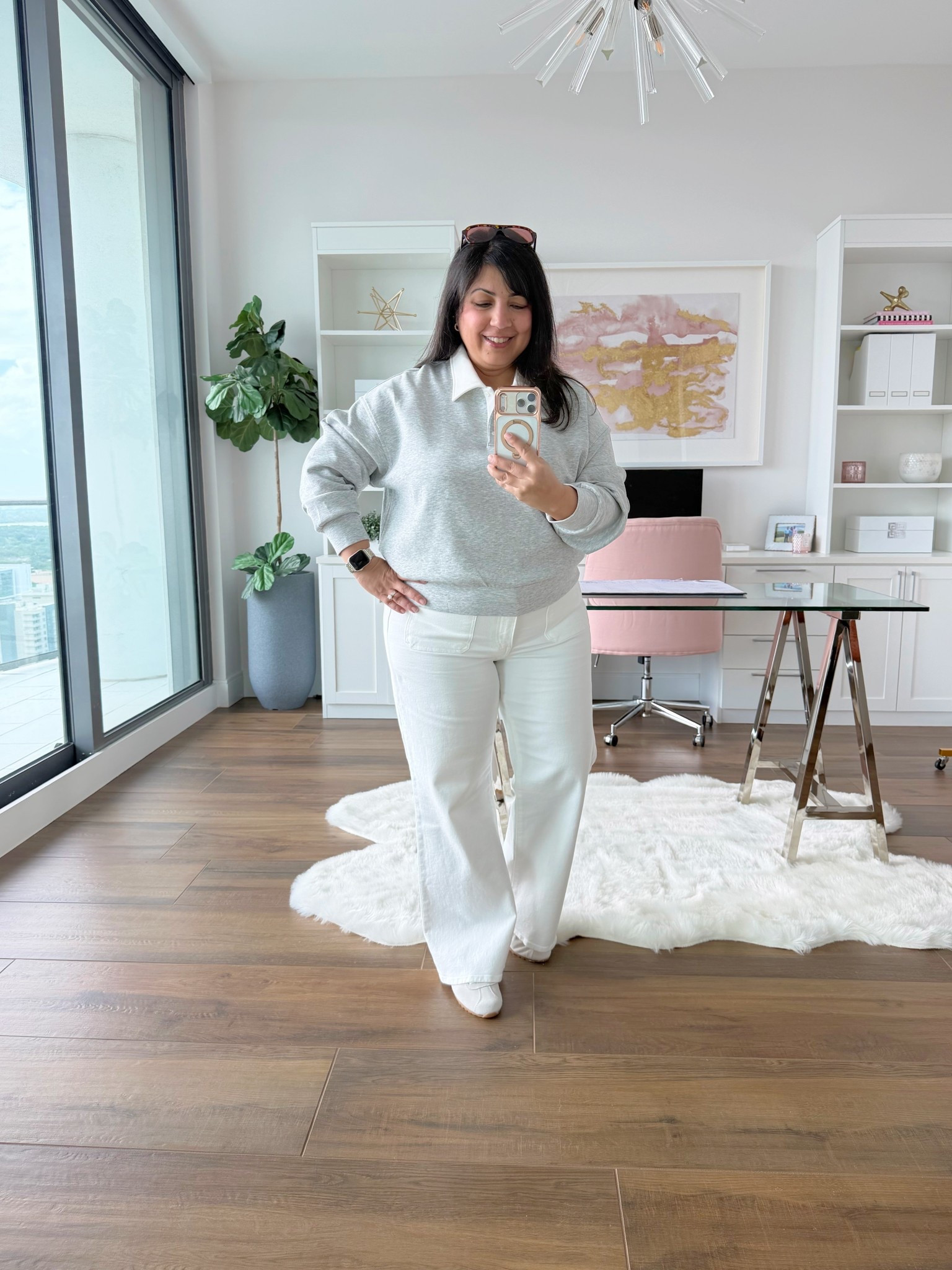 Polo sweaters and sweatshirts are popping up everywhere and this one is super affordable and on sale today for under $25! Available in 3 colors but I’m loving this neutral gray and white combo. Pair it with jeans for a casual weekend outfit or everyday look. 

Old Navy polo sweatshirt size large. Madewell white jeans size 32 Short. Dolce Vita low profile sneakers. I usually wear a 7.5 or 8 in shoes and I got these in an 8. Madewell aviator sunglasses.

Spring outfits 2026, travel outfits, outfits with white jeans, jeans and sneakers, midsize petite outfit, over 40 style, over 50 style

#LTKMidsize #LTKPetite #LTKSaleAlert