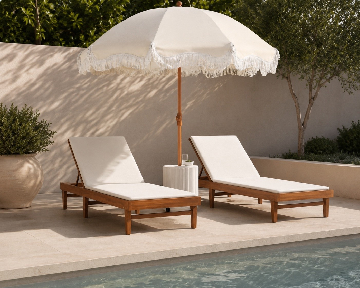 I’ve been planning a little lounge area in my backyard for the longest time… and I finally ordered this setup. 🤍☀️

I cannot wait to style it all together. The loungers, fringe umbrella, and neutral tones are exactly the relaxed resort-inspired look I’ve been wanting for this space. 🍋✨

#LTKHome #OutdoorLiving #BackyardInspo #PatioDecor #ModernOrganicStyle #SummerStyle #LTKSeasonal