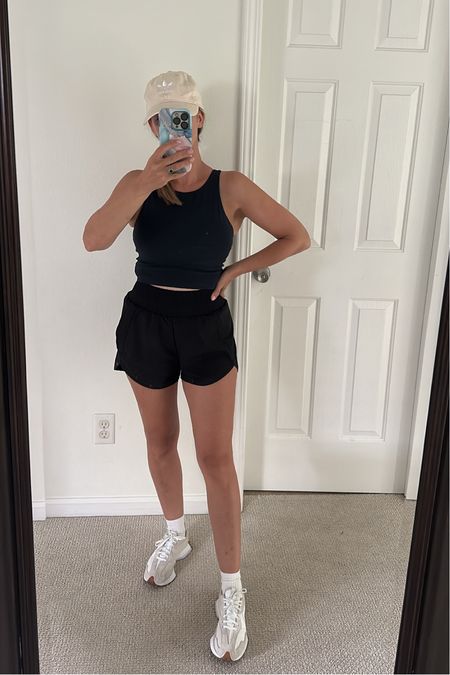The most luxe buttery soft workout top under  $30 super flattering. Wearing medium in top small in shorts sneakers fit tts and are very comfortable 