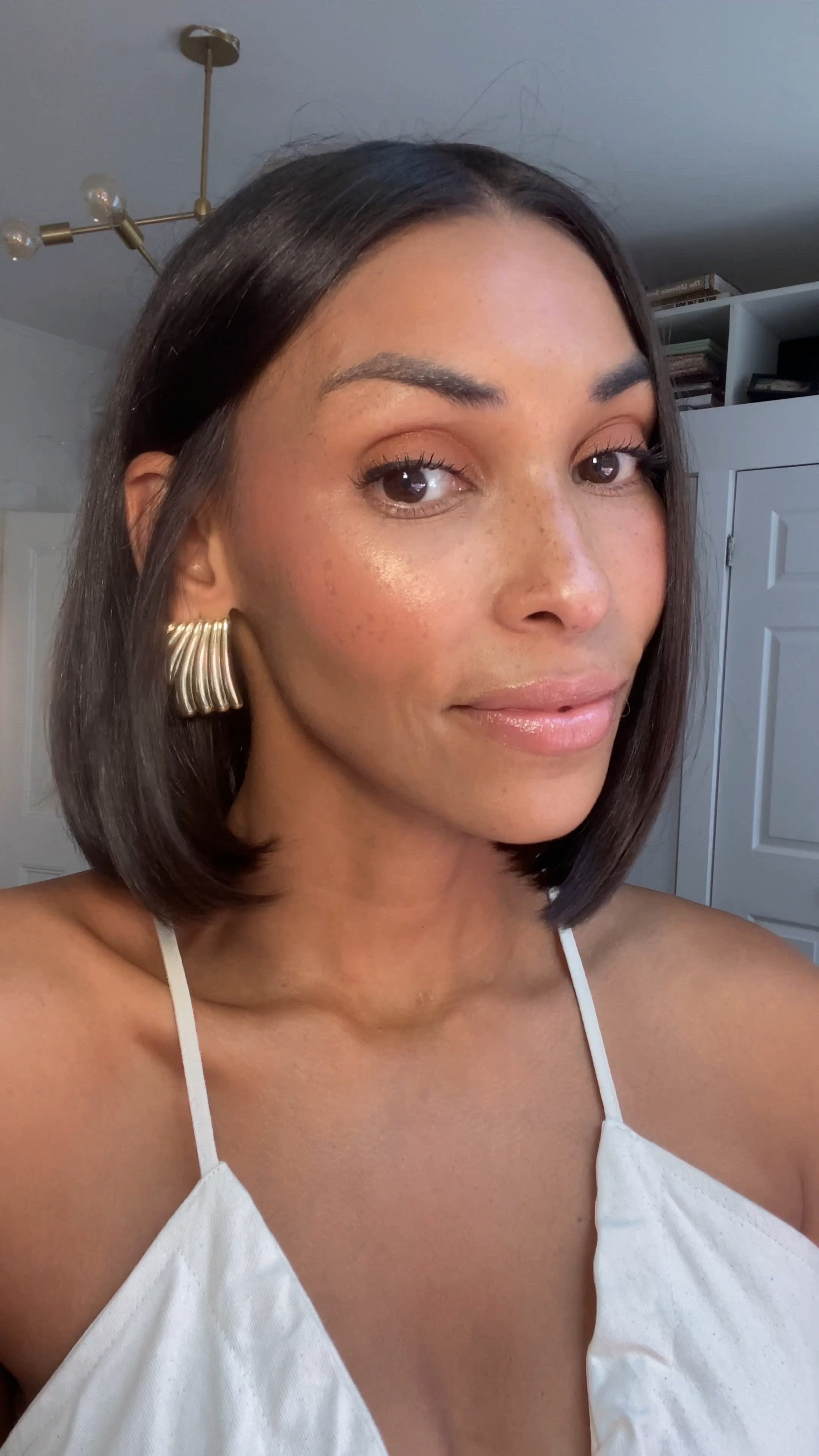 Over 40 beauty the ombré tutorial, so easy and looks so pretty! 
Step 1: Prep your base 
Step 2: Dot — 3 dots of lighter shade on top of cheekbones and then 2 dots of darker shade just below 
Step 3: Blend 
Step 4: Add Highlighter (you can also dot the highlighter above the lighter dots and blend) I like just dabbing it on for a stronger highlighter effect 

I am using @hudabeauty Blush Filter in colors cotton candy + peach sorbet — you can shop them in my LTK or head to my link in bio under “Beauty” ✨ 

What do you think of this technique, will you try?!

#LTKover40 #LTKbeauty