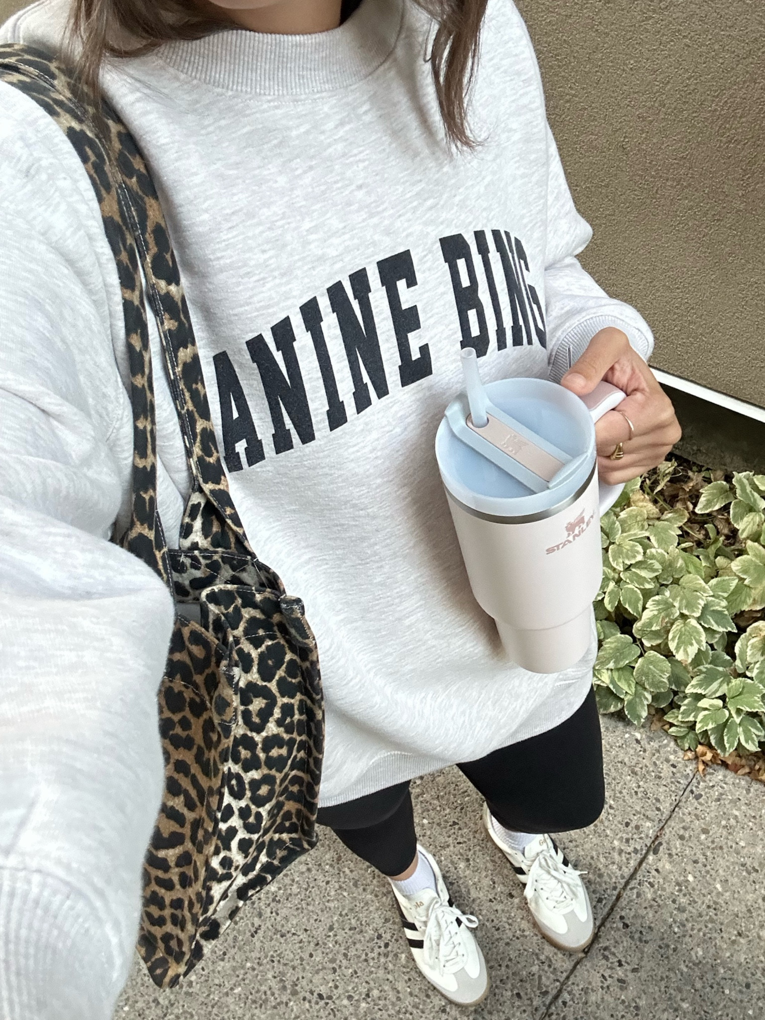 Athleisure outfit inspiration!

-Anine Bing graphic sweatshirt, I have a medium. 
-Lululemon black 7/8 leggings, I have a size 8. 
-Ganni leopard print tote bag. 
-Gola white and black sneakers. 
-Stanley pink tumbler. 


#LTKfitness #LTKstyletip #LTKautumn