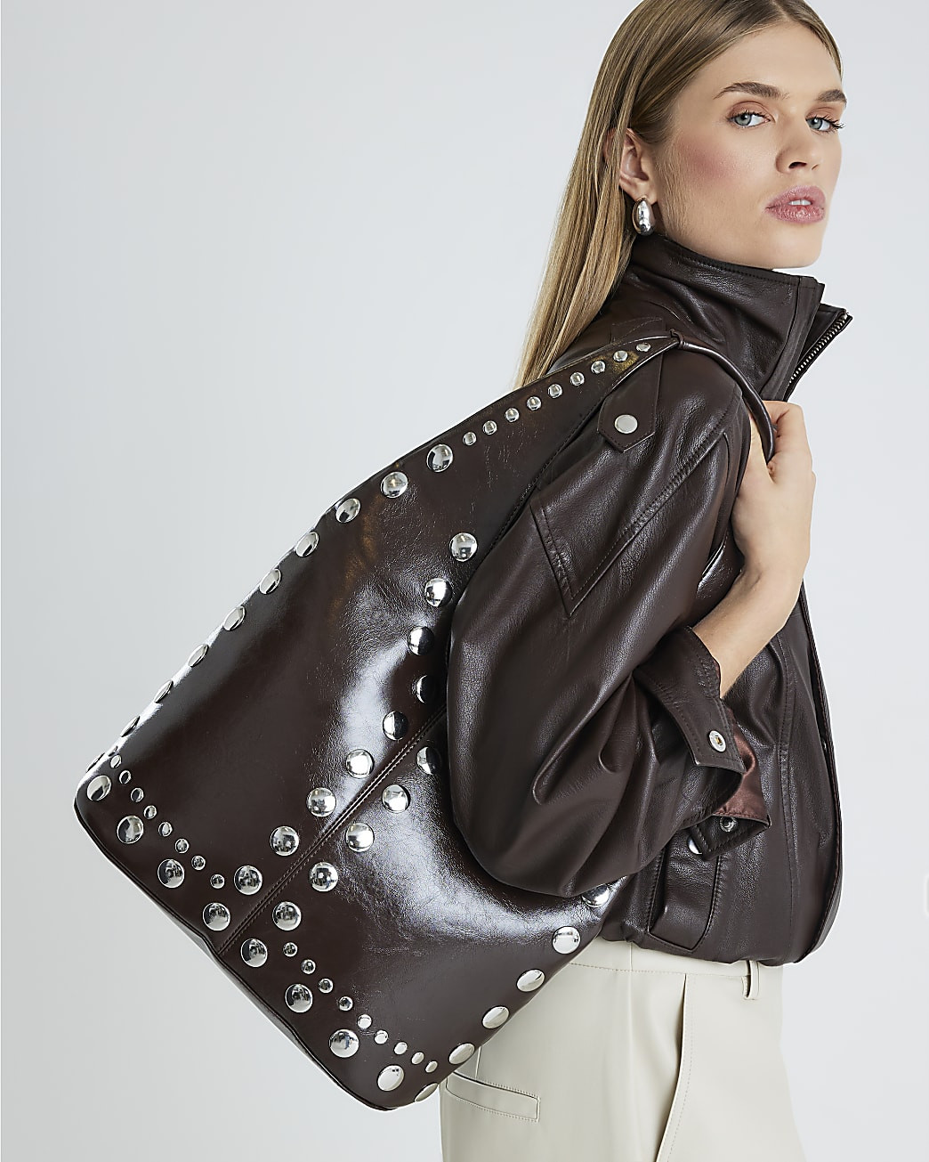 Brown Studded Seam Slouch Shoulder Bag | River Island UK & IE
