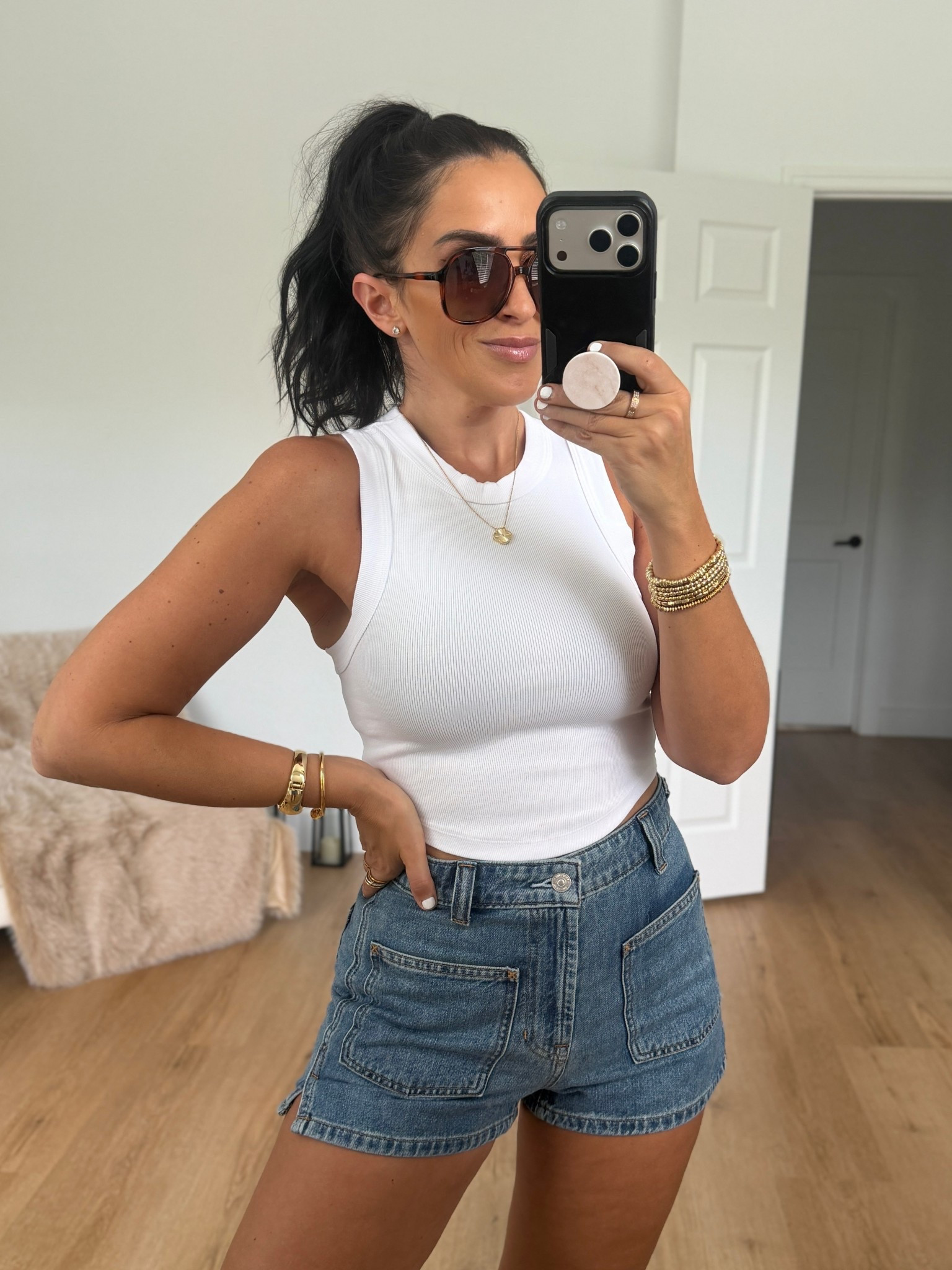 Vitamin A® Daybreak Essential Crop Tank wearing size small. Free People Bettie Sailor Patch Pocket Denim Shorts (Vixen) Wearing size 27