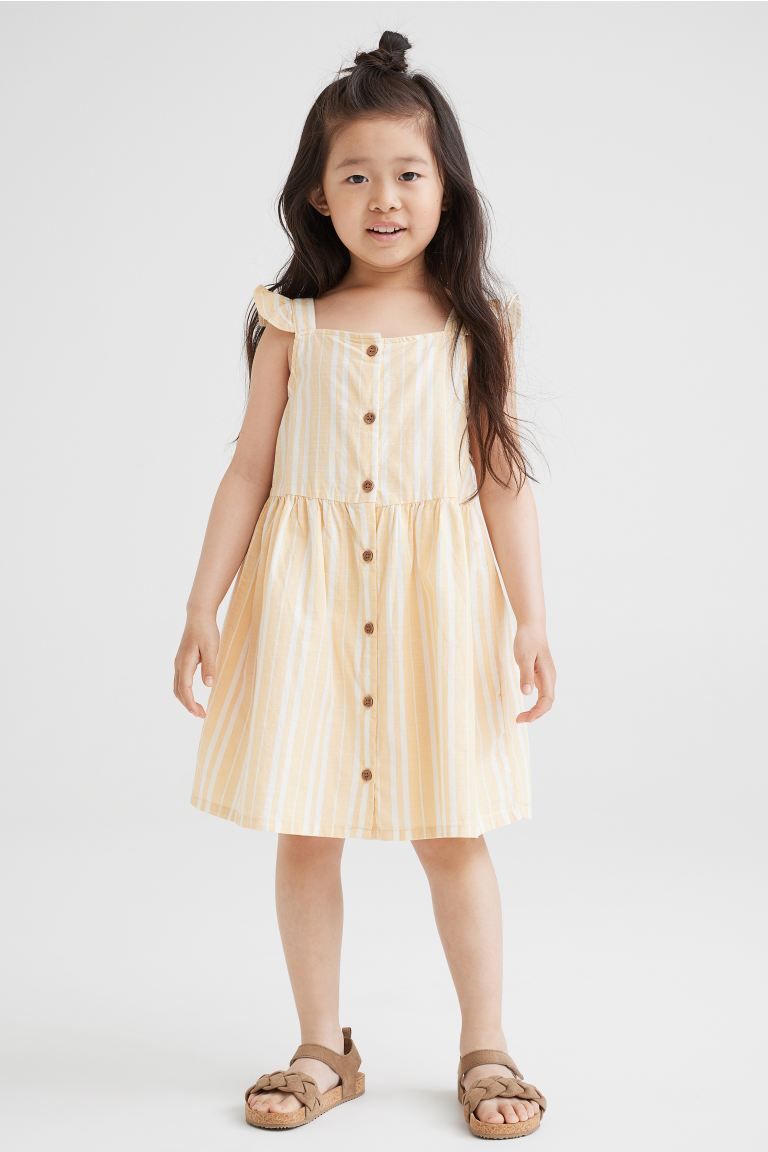 Knee-length, sleeveless dress in airy, woven cotton fabric. Flounce-trimmed shoulder straps, squa... | H&M (US + CA)