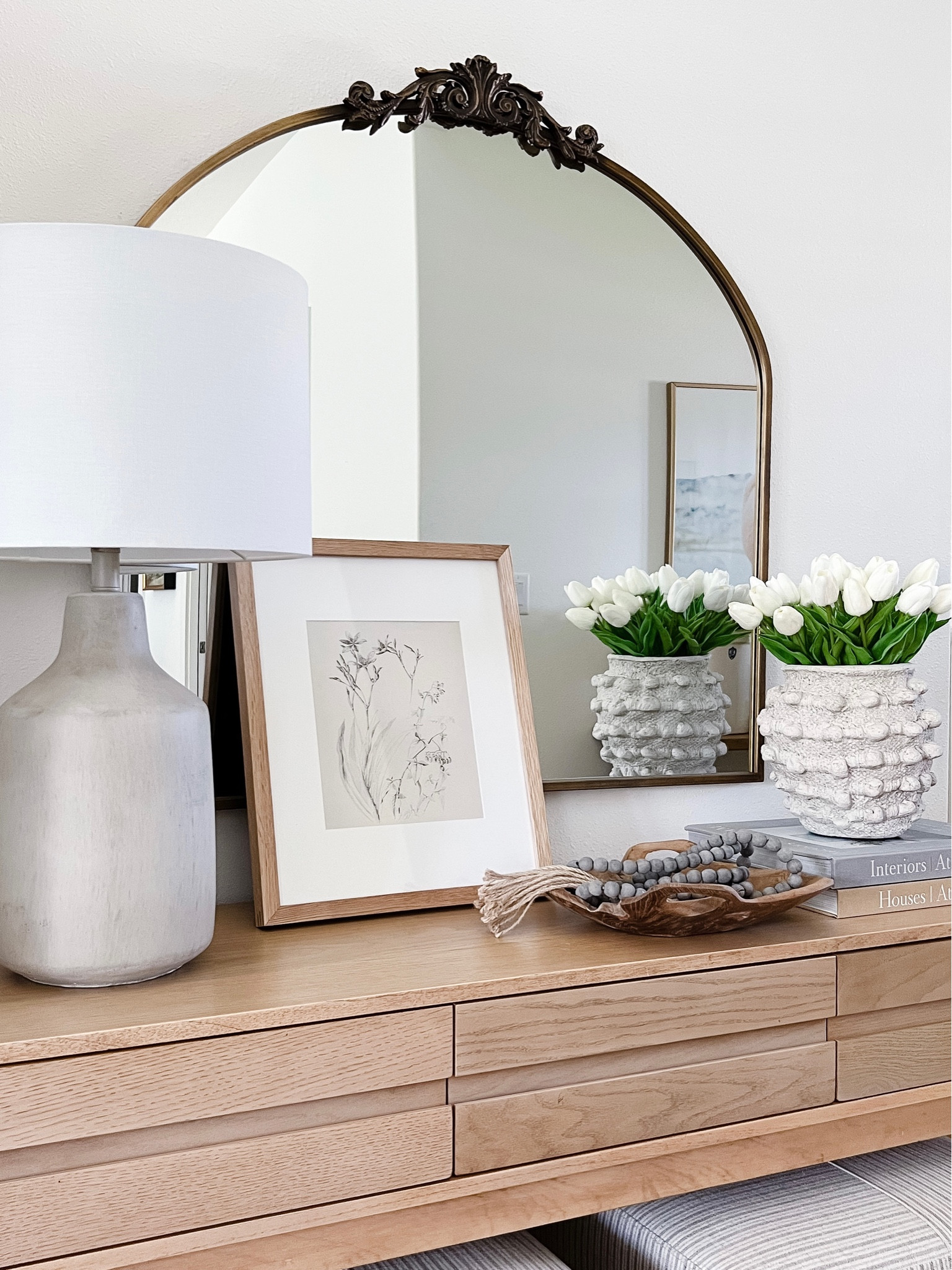 For this console table look I styled my new vase filled with faux tulips opposite my concrete table lamp  

#LTKhome #LTKFind #LTKstyletip