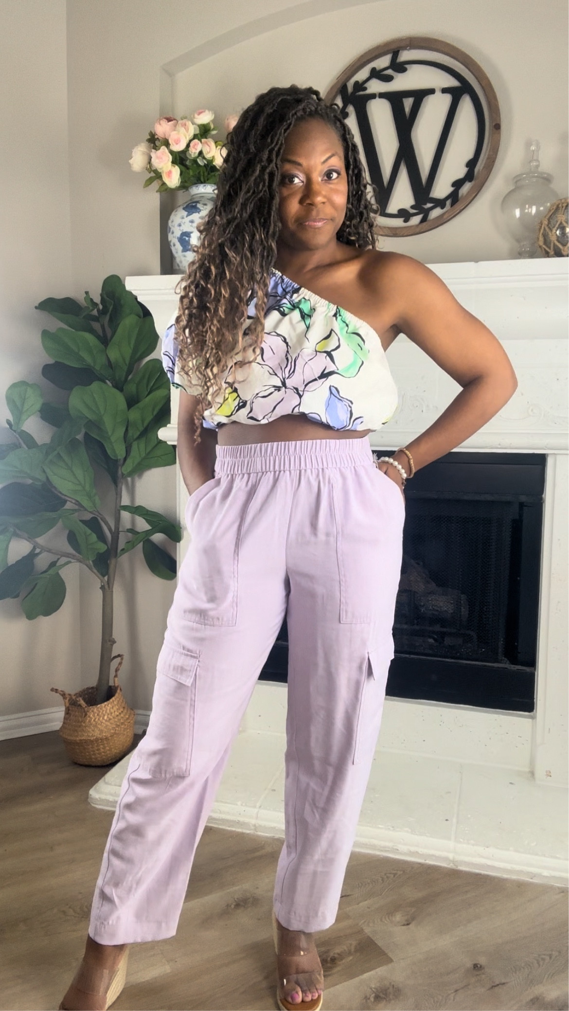 Light purple lilac, cargo pants outfit! Just add this floral off the shoulder cropped blouse and clear wedge sandals to complete the look. This crop top also comes with a matching skirt! 

#LTKtravel #LTKparties #LTKstyletip