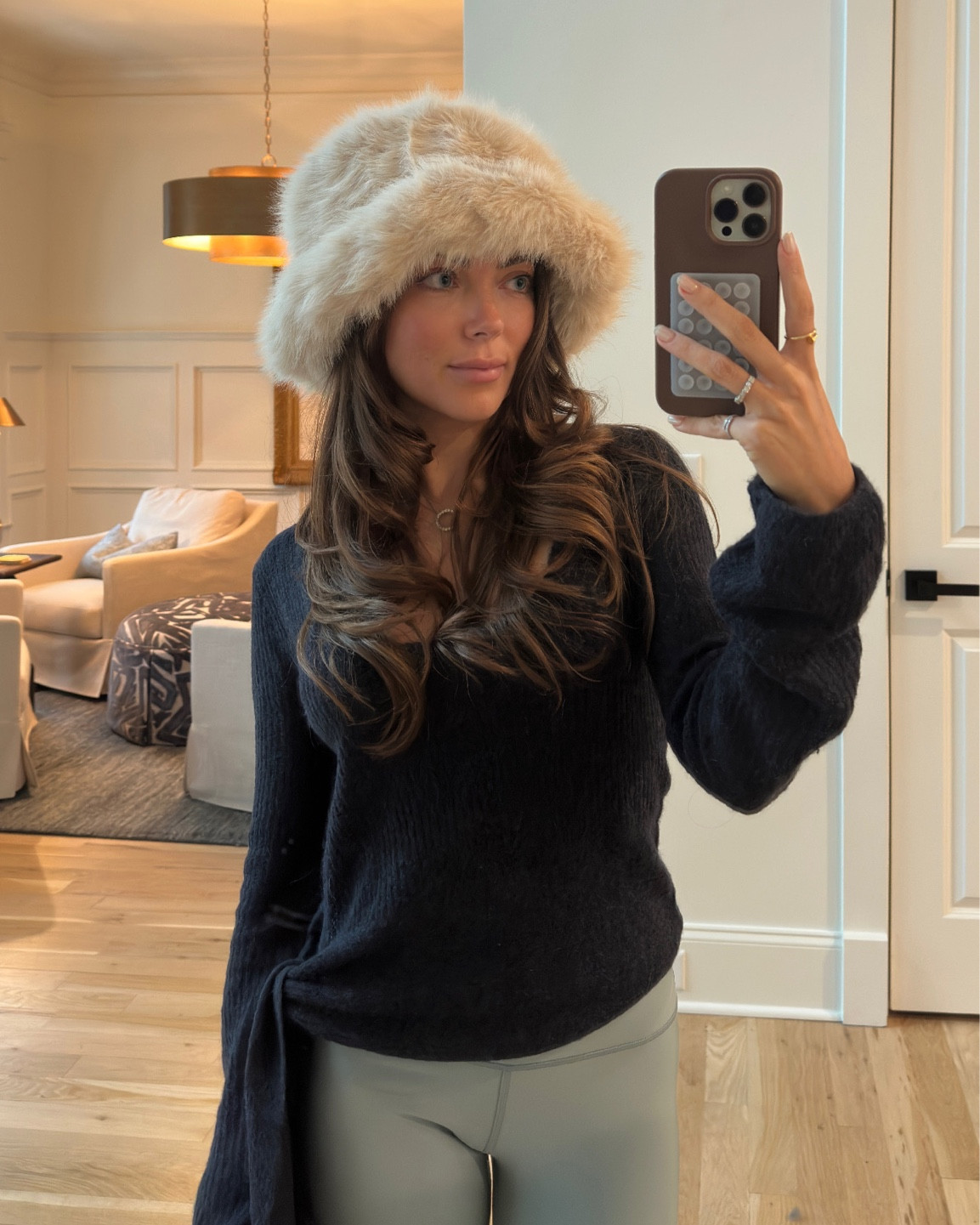 Textural Play: Beige Faux Fur Hat with Knit Sweater and Leggings — Fur Hat Outfits