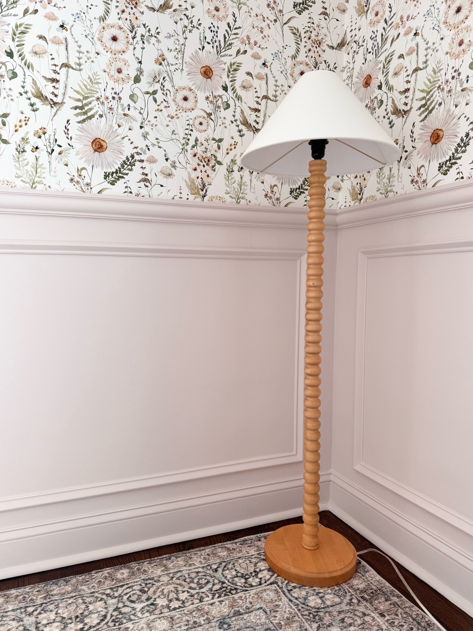 This corner is the perfect example of how a few thoughtful details can transform a space. The floral wallpaper, soft paneling, and sculptural floor lamp create a room that feels feminine, timeless, and full of character.

floral wallpaper, floor lamp, statement lighting, girls room decor, bedroom inspiration, wallpaper ideas, paneled walls, neutral home decor, feminine interiors, cozy bedroom design, timeless home style, girlonthehudson

#LTKSeasonal #LTKHome #LTKdayinmylife
