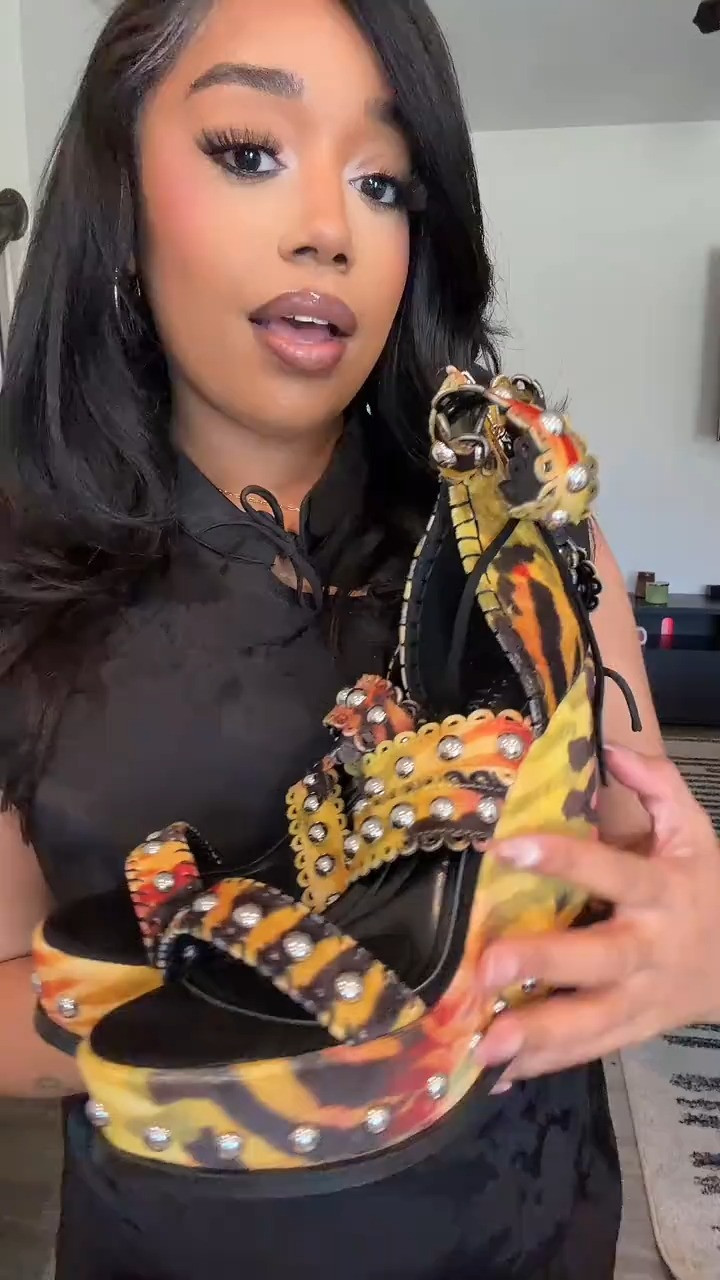 Turn heads with the Gold Zania Tiger Multi Print Fringe Embellished Wedge Sandal by AKIRA. Featuring bold tiger print, gold tones, and fringe details, these statement wedges are perfect for vacation outfits, summer parties, and girls night out looks. Pair them with dresses or sets for a standout style.

#WedgeSandals #TigerPrint #StatementShoes #VacationStyle #GirlsNightOut #TrendyShoes #WomensFashion #FashionFinds 

 #LTKdayinmylife #LTKgrwm #LTKootd