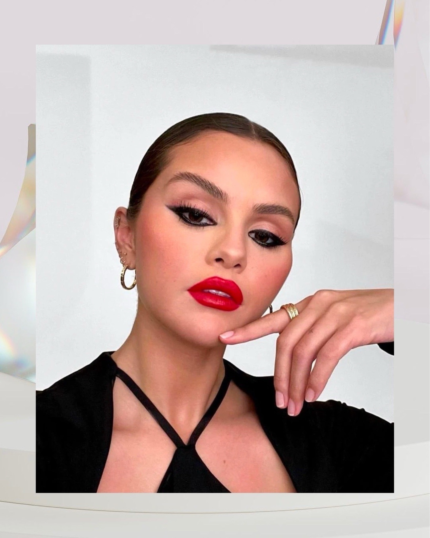 How To Wear Bold Eyes And Bold Lips Together - More often than not, individuals tend to emphasize a single defining feature in their makeup, whether it’s a statement eye or a bold lip color. It’s uncommon to see both accentuated simultaneously – until now. Just as fashion rules are meant to be challenged, so are beauty norms. You have the creative freedom to enhance two features, creating a look that will undeniably turn heads. If the idea of combining a dark, smokey eye with a striking red lip seems daunting, let us reassure you. With the right techniques, showcasing both bold eyes and bold lips might soon become your preferred makeup style. Even icons like Selena Gomez embrace this captivating look. #beauty #makeup // Continue reading on TheCoolHour.com

#LTKbeauty