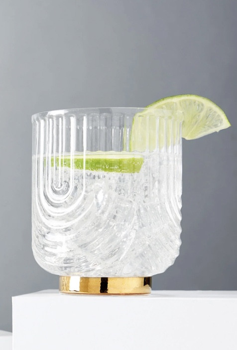 Polished gold and draping glass swathe the surface of this double old-fashioned duo, adding a vestige of the Gilded Age to an already elevated set of glassware.

#LTKhome #LTKparties