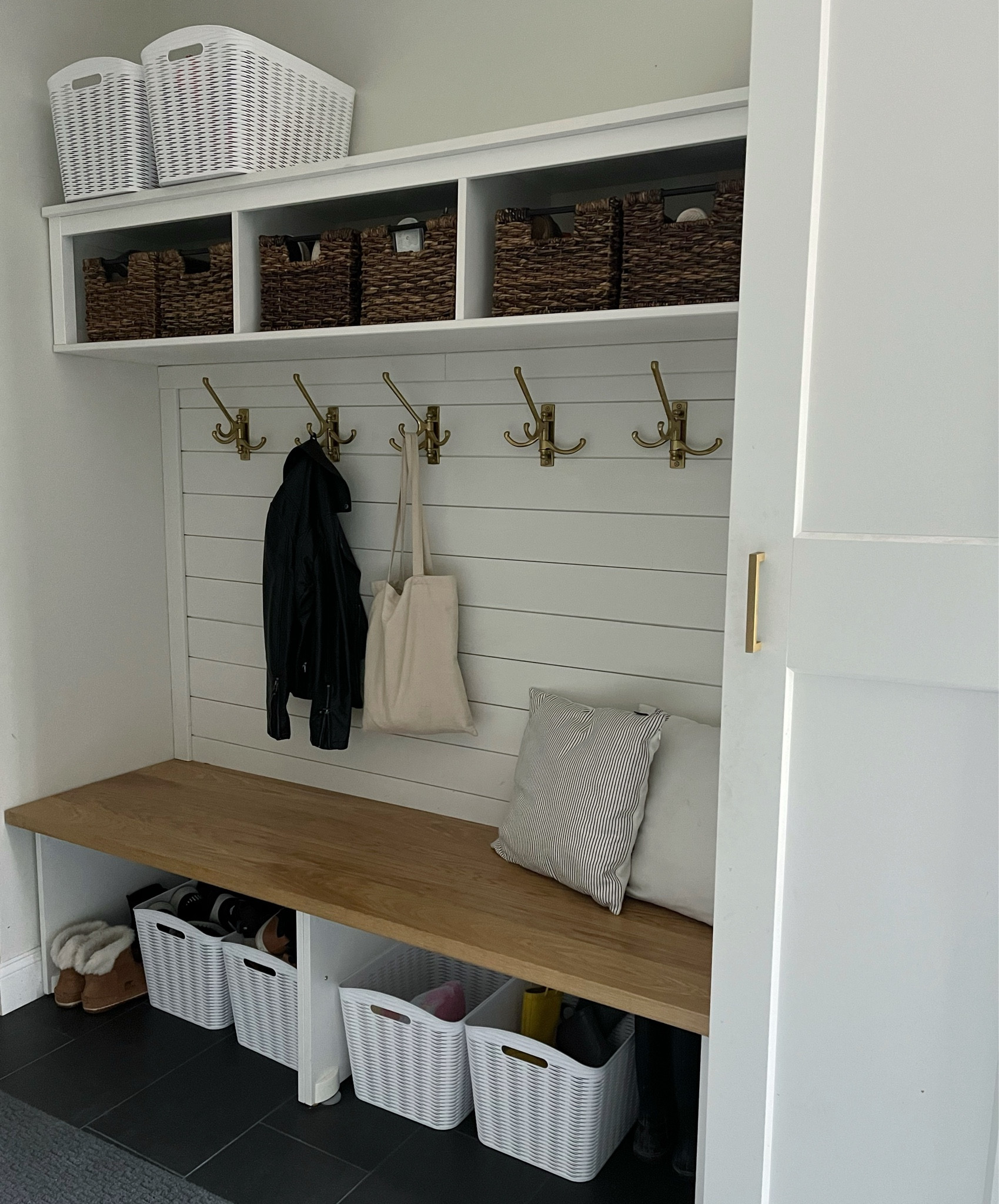 Adding white plastic baskets helped conceal all of the shoes 

#LTKhome #LTKfamily