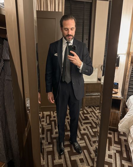 When the dress code says cocktail attire, always choose a dark suit, white shirt, and simple tie. I decided to go with a navy blue chalk stripe flannel suit paired with a charcoal gray wool flannel tie  

#LTKover40 #LTKmens #LTKparties