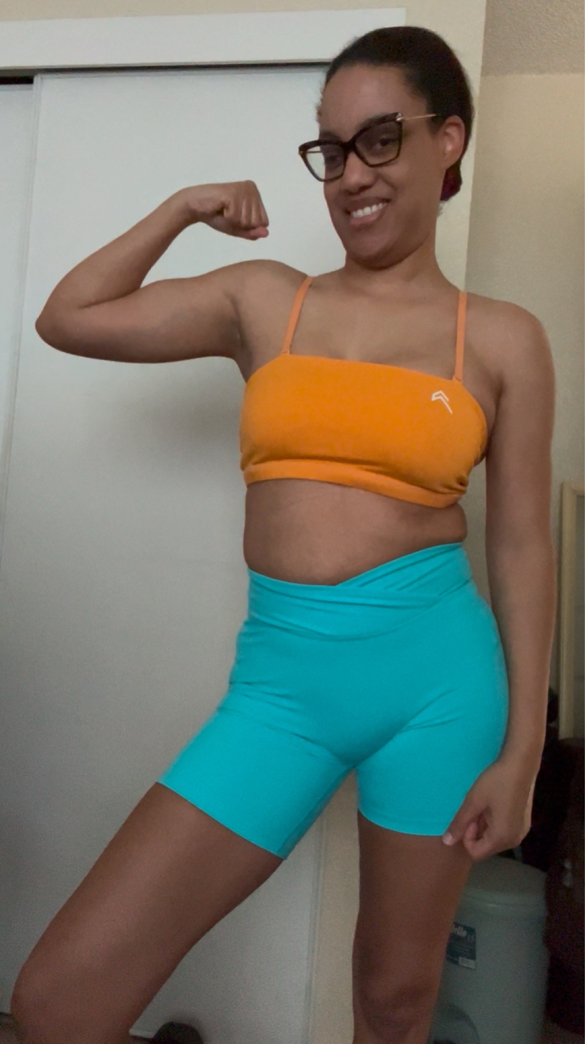 Apricot orange everyday bandeau bralette in medium and Aqua blue unified wrap shorts in medium .
@oneractive 

#LTKFitness #LTKFindsUnder50 #LTKActive