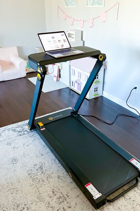 This folding, compact treadmill with a desk attachment is amazing!! It is honestly my favorite amazon purchase to date. You can walk or run and the desk attachment comes with it. 

Exercise, fitness, treadmill, work out, running, amazon find #amazon #amazonfind #fitness #workout 

#LTKfit #LTKFind