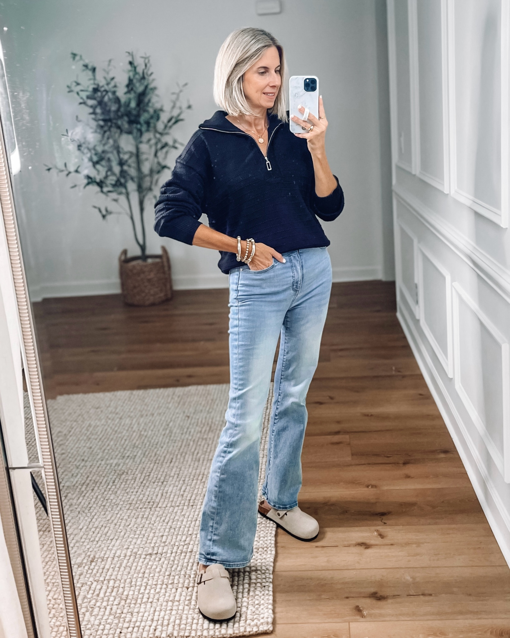 This Amazon half zip sweater will be a go to for me all fall and winter. Love the bubble sleeve and oversized fit. Wearing a small. Comes in other colors 

Light wash denim flare jeans wearing a 27. Amazon slip on clogs fit true to size 

Fall outfit ideas 
Amazon outfits 






#LTKVideo #LTKFindsUnder50 #LTKStyleTip