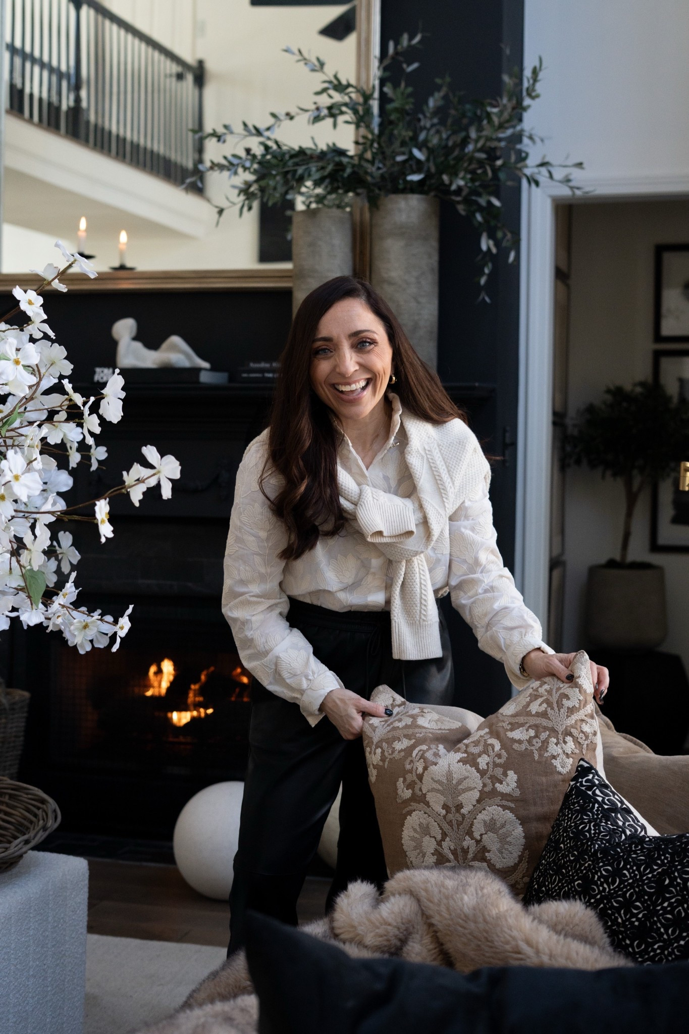 Omg yay spring is literally right around the corner and I am SO ready for it!!! I pulled out a light neutral outfit to match the brighter vibe in my living room and wow it instantly feels fresh and elevated. Cozy knit layers, classic black trousers, and soft dogwood stems just make everything feel clean, warm, and styled. I love when fashion and home decor work together, modern traditional style, luxury living room, seasonal decorating, and effortless spring styling all happening at once.

#houseofvalentina 

#LTKHome #LTKdayinmylife #LTKSaleAlert