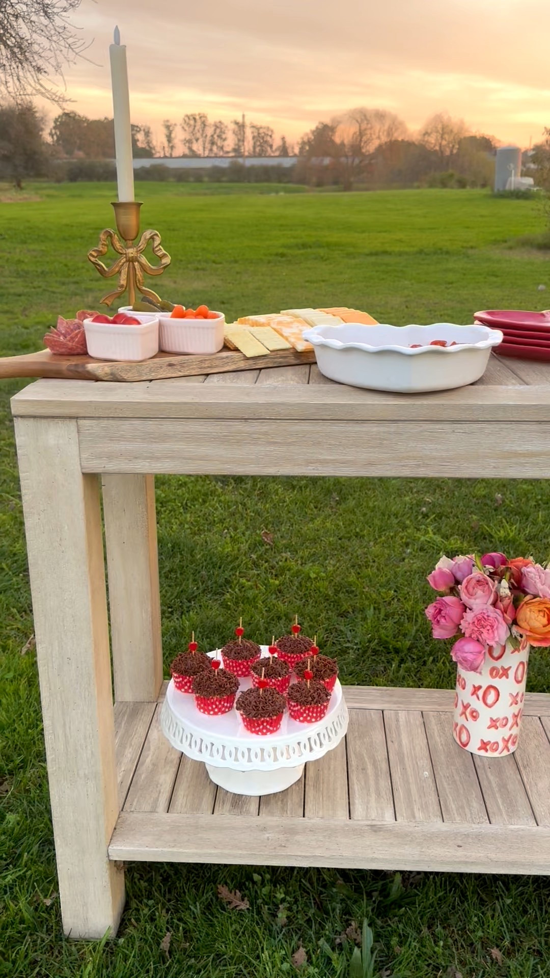 This beautiful Valentine’s Day outdoor console table was perfect at sunset! @Wayfair has so many beautiful heart shaped dishes, platters and entertaining essentials that really make a statement for Valentine’s Day and Galentine’s Day too! #ad #wayfair #wayfairpartner #valentinesday #galentinesday 

#LTKSeasonal #LTKHome #LTKValentine