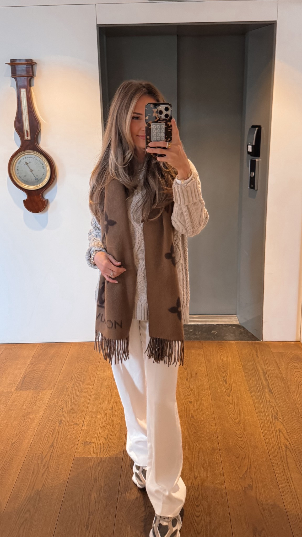 Cozy & classic neutrals today 🤎🧣 This cable knit sweater + Aritzia wide-leg pant combo has been my go-to while exploring Amsterdam — comfy for walking, but still chic with new balance sneakers and a statement scarf. Linking similar sweaters, my white pants, and neutral sneakers!

neutral winter outfit, cable knit sweater outfit, winter travel outfit, comfy airport style, wide leg pants outfit, neutral sneakers

#LTKootd #LTKgrwm #LTKvlog