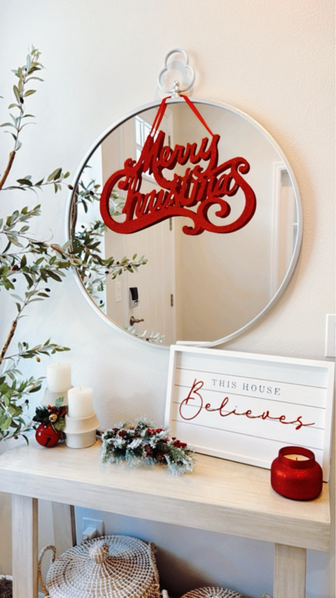 Christmas Decor 🎄✨ 
I added this holiday decor to the console table in our home’s entryway to cozy up the space during the holiday season. It’s a great way to welcome guests when hosting holiday parties. 

At our entryway, we have a small lightwashed console table. On the bottom shelf of this entryway table, we have woven lidded baskets for storage. Above the console table, we hung a decorative wall mirror. Beside the console table, we placed an olive tree. 

For Christmas, I decorated this entryway area with a few seasonal signs and candles! This candle also makes a great holiday gift  

#LTKHoliday #LTKHome #LTKSeasonal