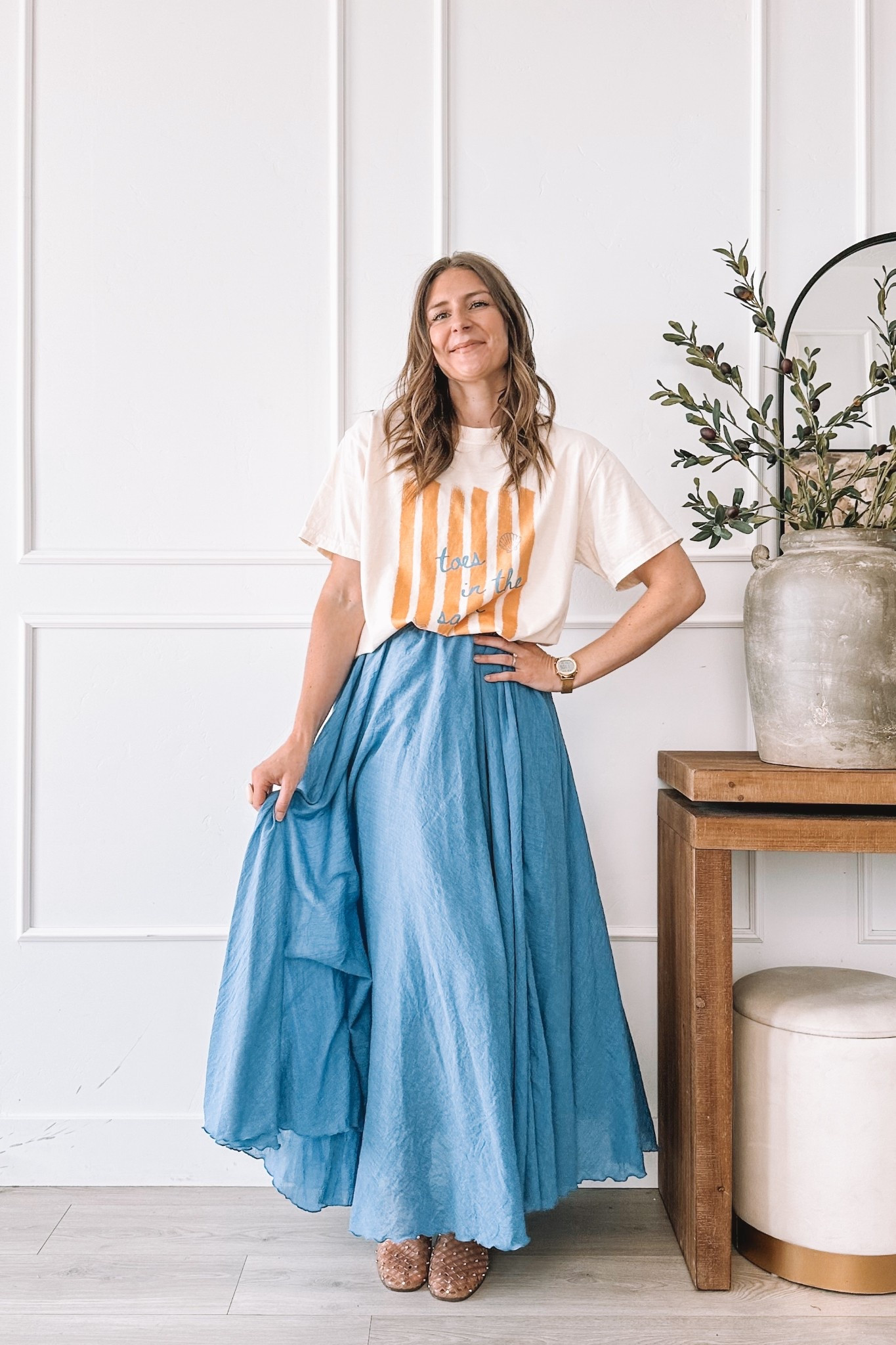 Toes in the sand graphic tee with a flowing blue maxi skirt and studded sandals. Wearing a large in the tee. I am 5’8” and typically a small so size up at least two sizes for an oversized fit. All pieces linked here.​​​​​​​​​​​​​​​​

#LTKootd #LTKgrwm #LTKmomlife