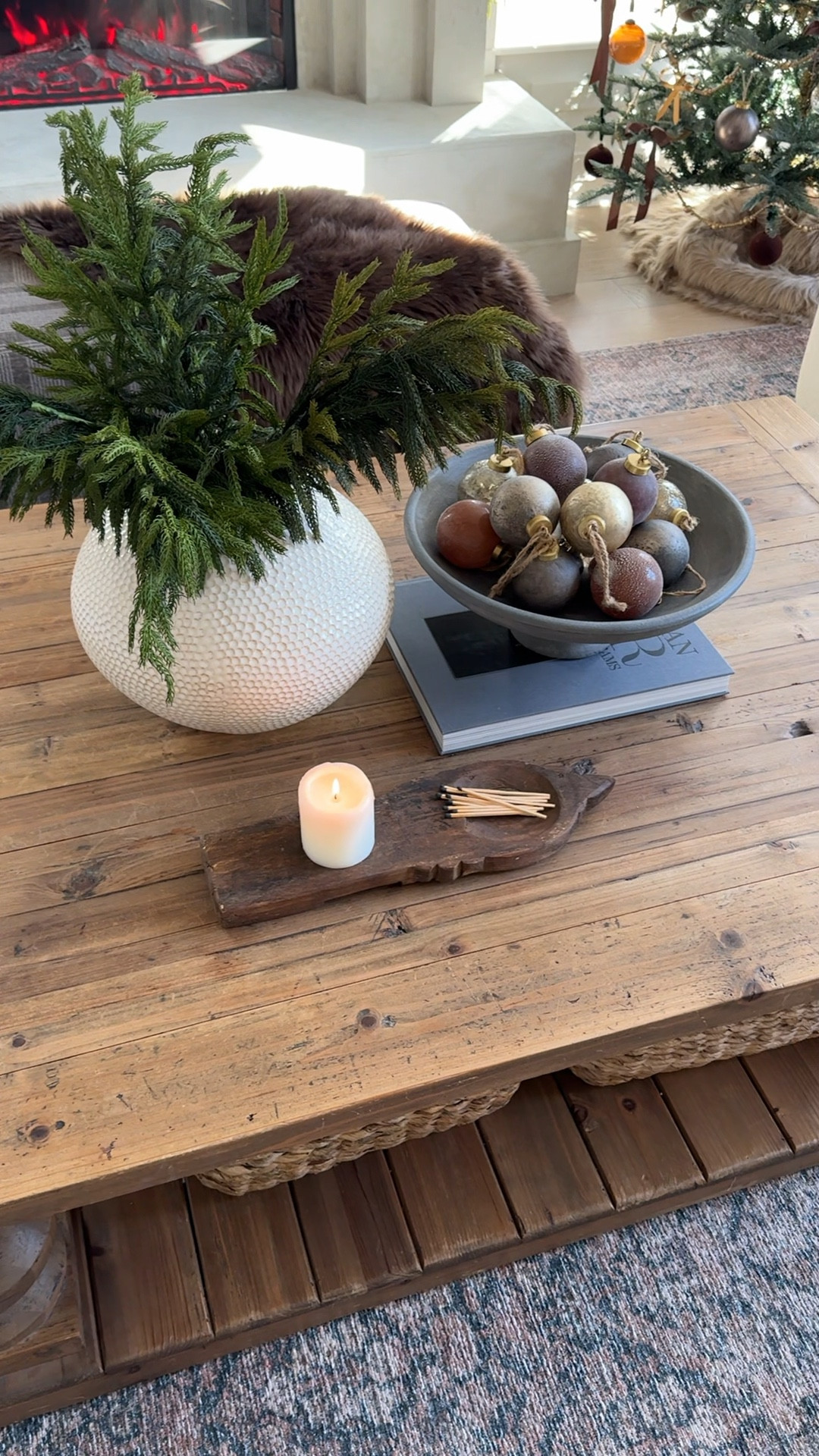 Coffee table, vase, bowl, Christmas ornaments, Norfolk stems, rug

#LTKHome #LTKHoliday #LTKWatchNow