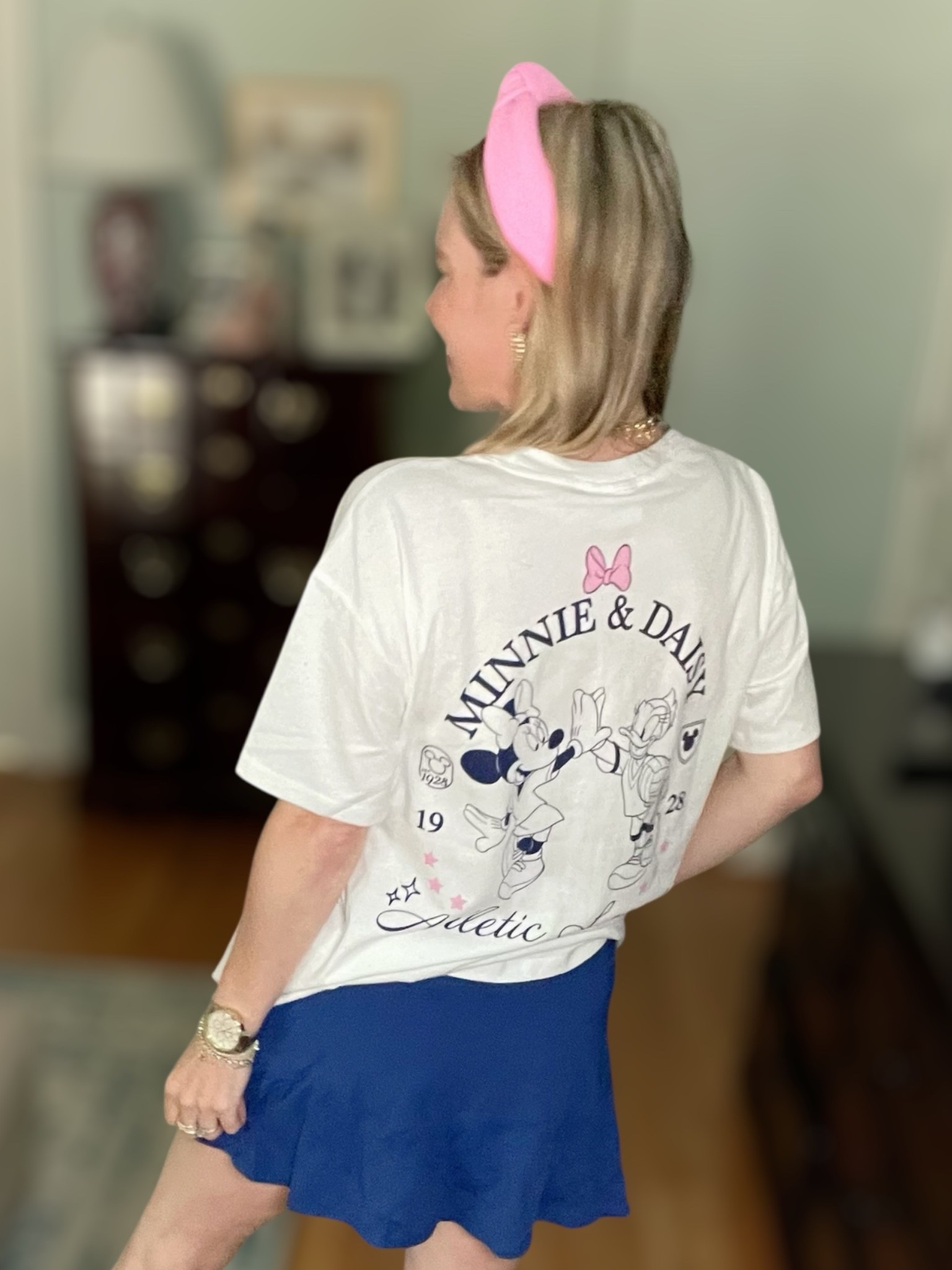 💗 Use code PREPPYREBEL for 10% off my Melinda Maria jewelry stack! #MelindaMariaPartner 💛💫

🎀 Sporty meets sweet with this adorable Minnie & Daisy graphic tee + retro sneaker moment! Whether you’re headed to the parks, running errands, or just channeling some nostalgic Disney vibes, this look is full of playful personality and comfy-cute details!

👕 Tee: Minnie & Daisy Athletic League graphic shirt from Target – oversized, lightweight, and full of vintage varsity charm 💖
🧦 Socks: Disney x Skinnydip Minnie Mouse crew socks – I couldn’t choose just one, so I styled both the pink “1928” pair and the white laureled Minnie!
👟 Sneakers: Adidas sneakers with pink stripes for that perfect pop 🎀
🎀 Headband: Pink knotted headband to tie in the Minnie theme 💗
💍 Jewelry: Layered Melinda Maria necklaces – Lil Frankie Chain + Not Your Basic Samantha Tennis Necklace in Blue Opal (code PREPPYREBEL saves you 10%!)

🩵 Skirt: Blue athletic skort adds a sporty twist – great for summer walks, tennis, or just twirling around 💃🏼

📸 A fun, easy everyday Disney-inspired outfit that’s as comfy as it is cute!

#PREPPYREBEL #MelindaMariaJewelry #DisneyStyle #MinnieAndDaisy #TargetStyle #LTKunder50 #AdidasStyle #LTKActivewear #SportyChic #LTKcasual #MinnieMouseStyle #LTKBackToSchool 🏸✨

#LTKFindsUnder100 #LTKFindsUnder50 #LTKTravel
