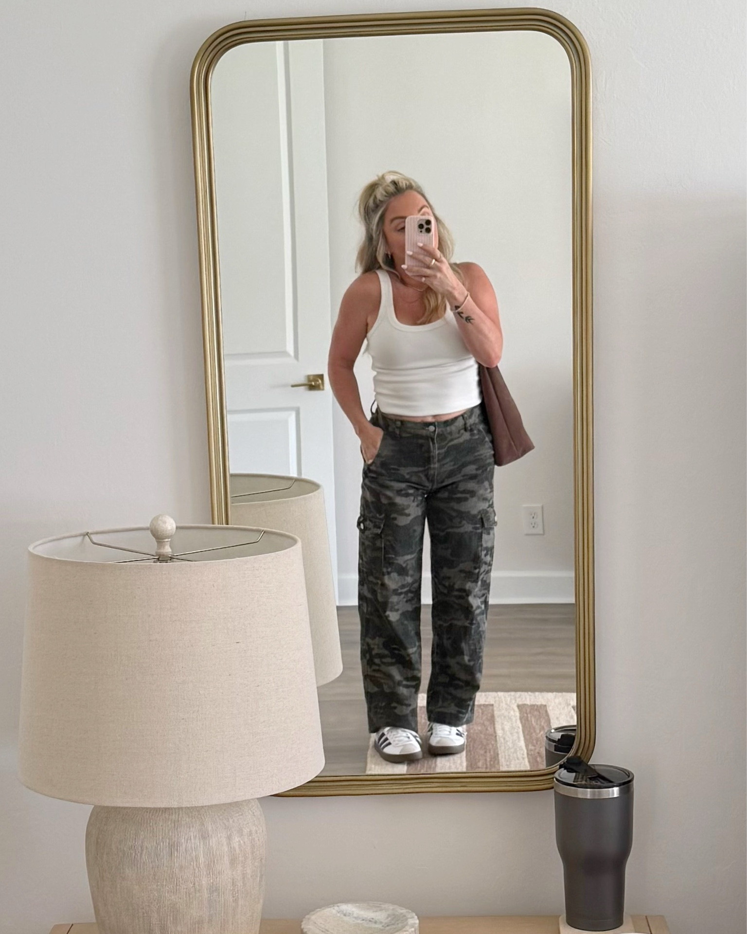 OOTD 💚🤎



#datenight #casualstyle #camopants  #whitetank #sneakers #momstyle

#LTKootd