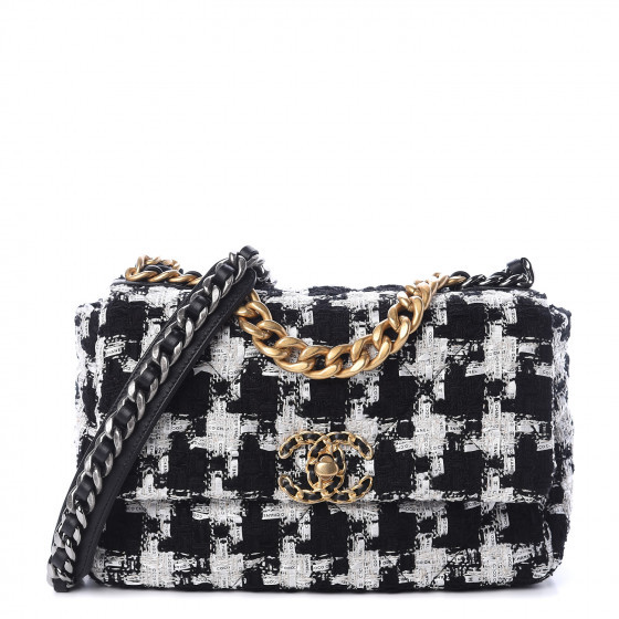 CHANEL

Tweed Quilted Medium 19 Flap Black Ecru White


122 | Fashionphile